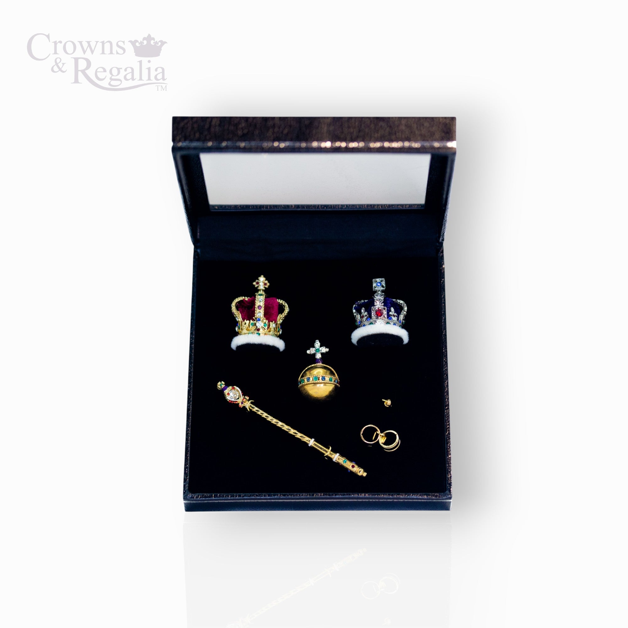 Set of miniature crowns and regalia in a 'Crowns & Regalia' box on a white background.