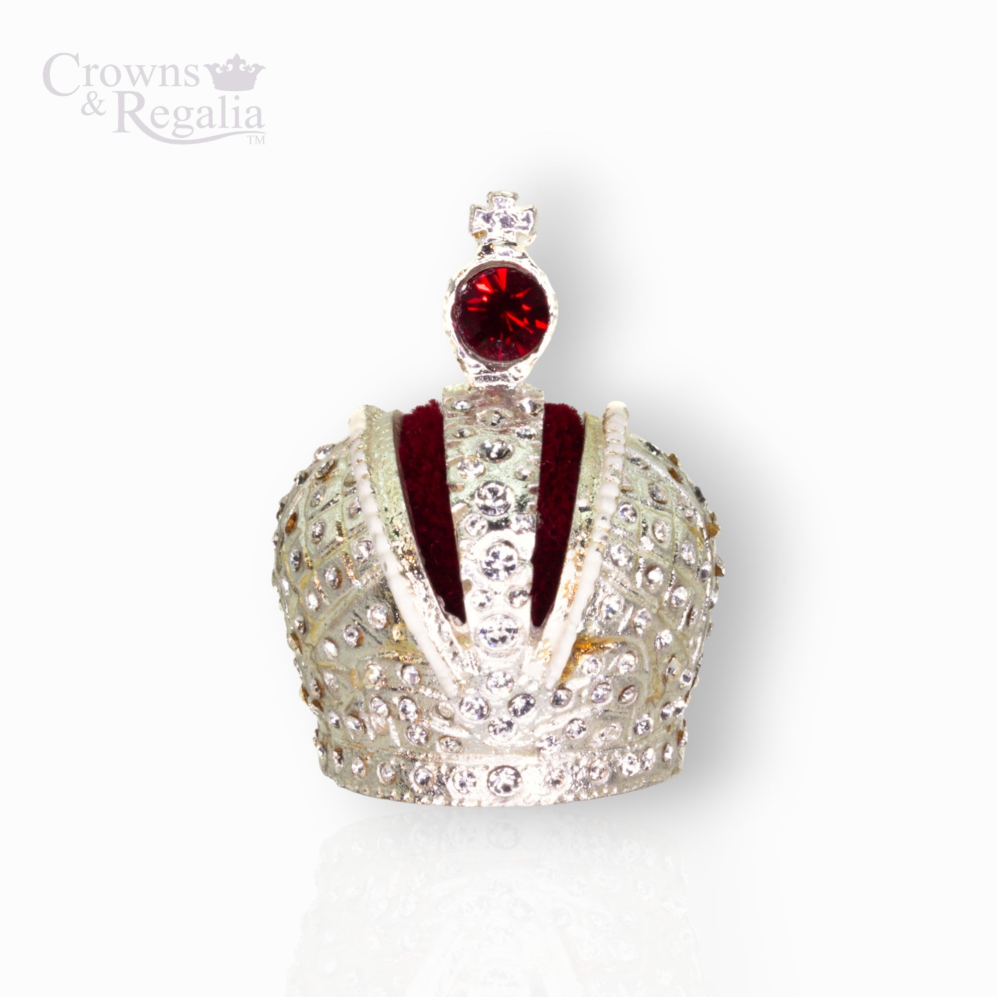 Decorative crown with red gemstone on a white background, branded 'Crowns & Regalia'.