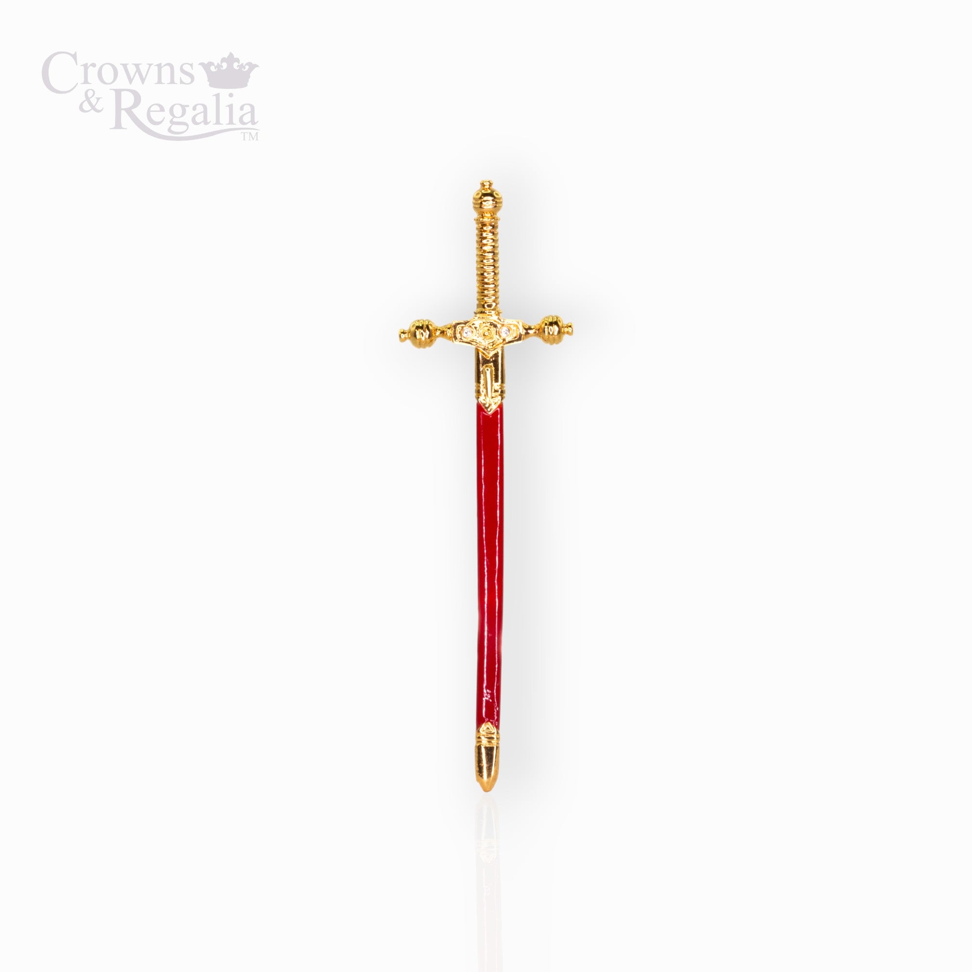 Decorative sword with gold hilt and red blade on a white background, branded 'Crowns & Regalia'.