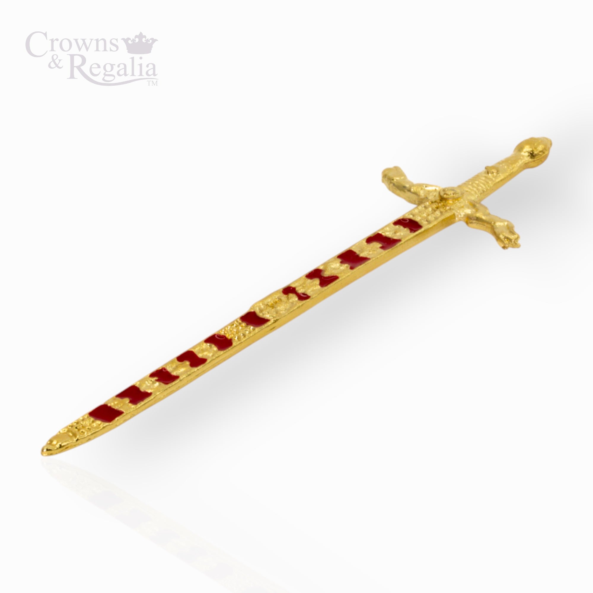 Decorative gold sword with red enamel on a white background, branded 'Crowns & Regalia'.