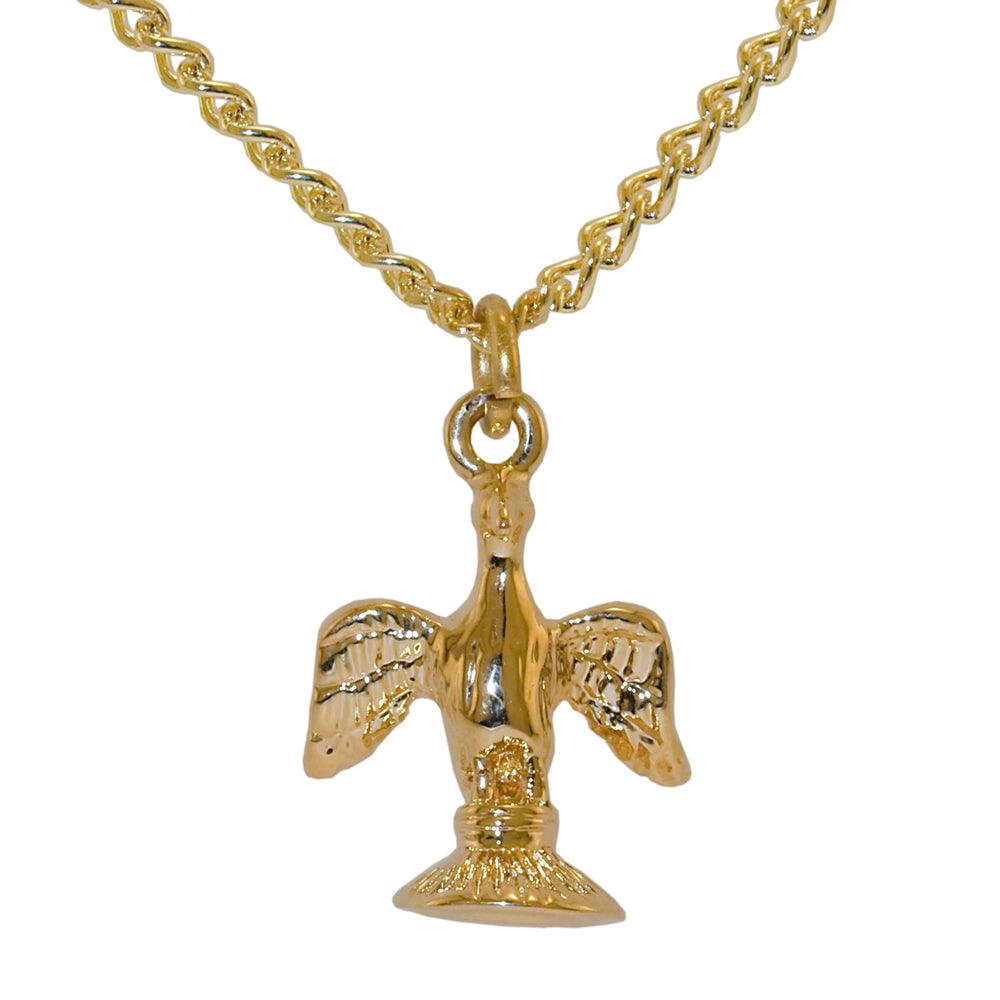 Gold pendant necklace with a detailed design on a white background.