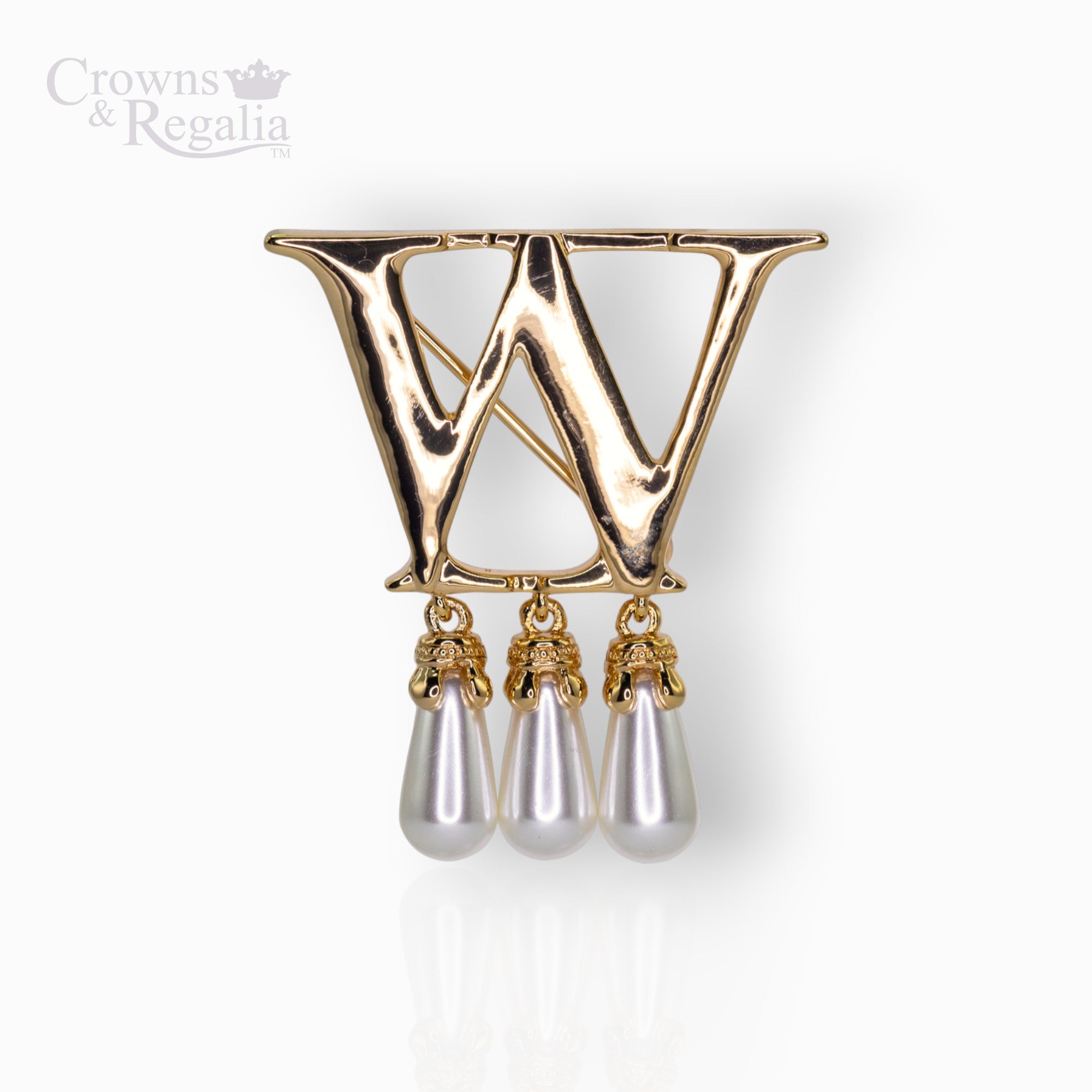 Gold brooch with 'W' design and pearl-like droplets on a white background, branded 'Crowns & Regalia'.