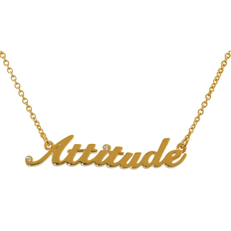 Gold necklace with 'Attitude' pendant on a white background