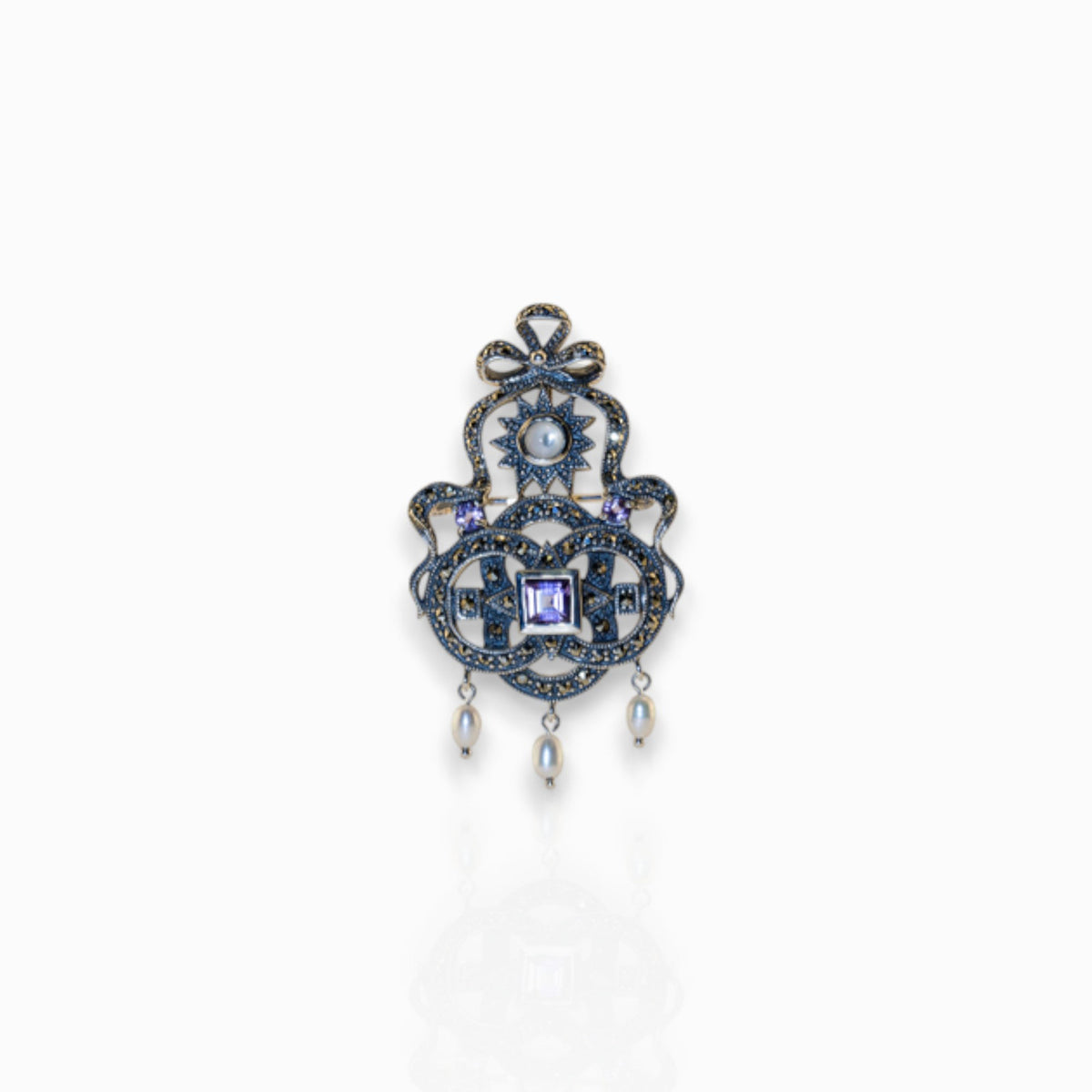 Shakespeare Jewel - Brooch on a white background.