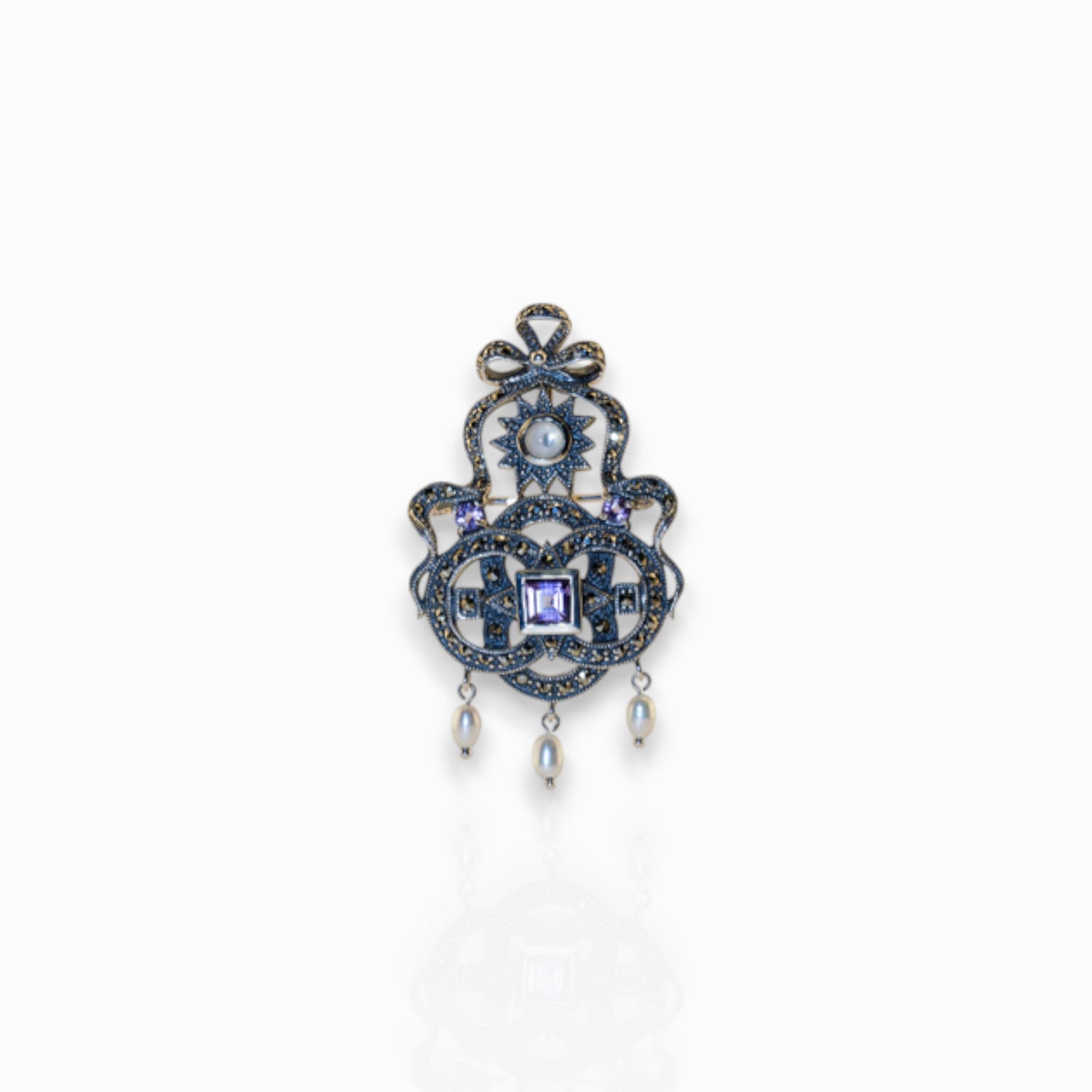 Shakespeare Jewel - Brooch on a white background.