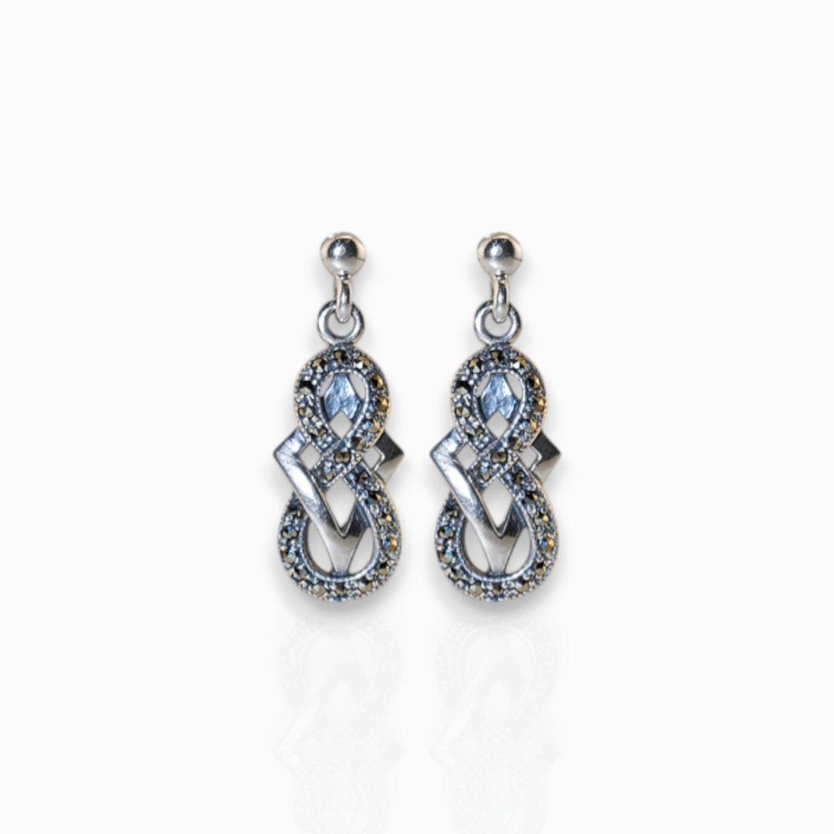 Shakespeare Jewel - Earrings on a white background.