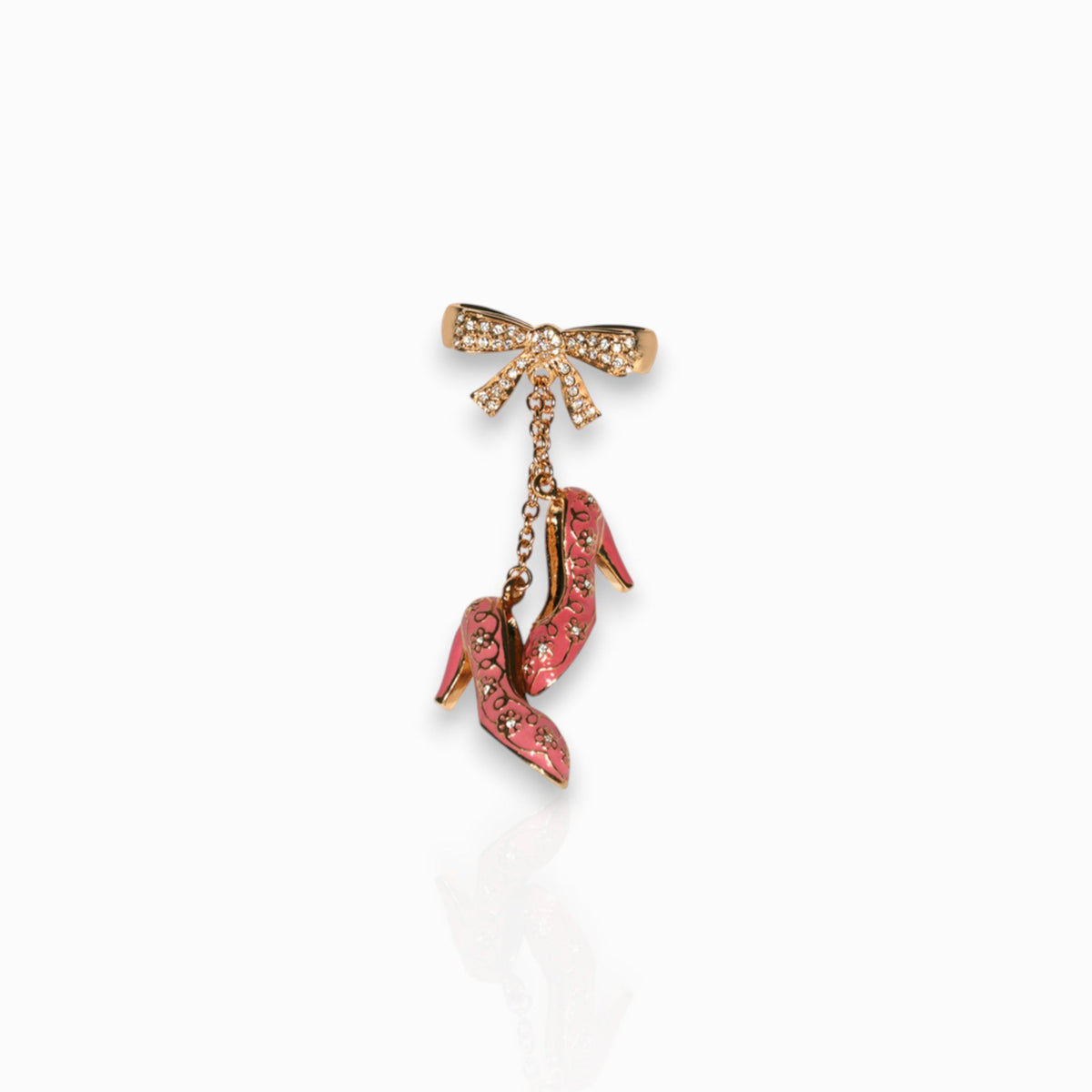 Pink Shoe Charm - Brooch on a white background.