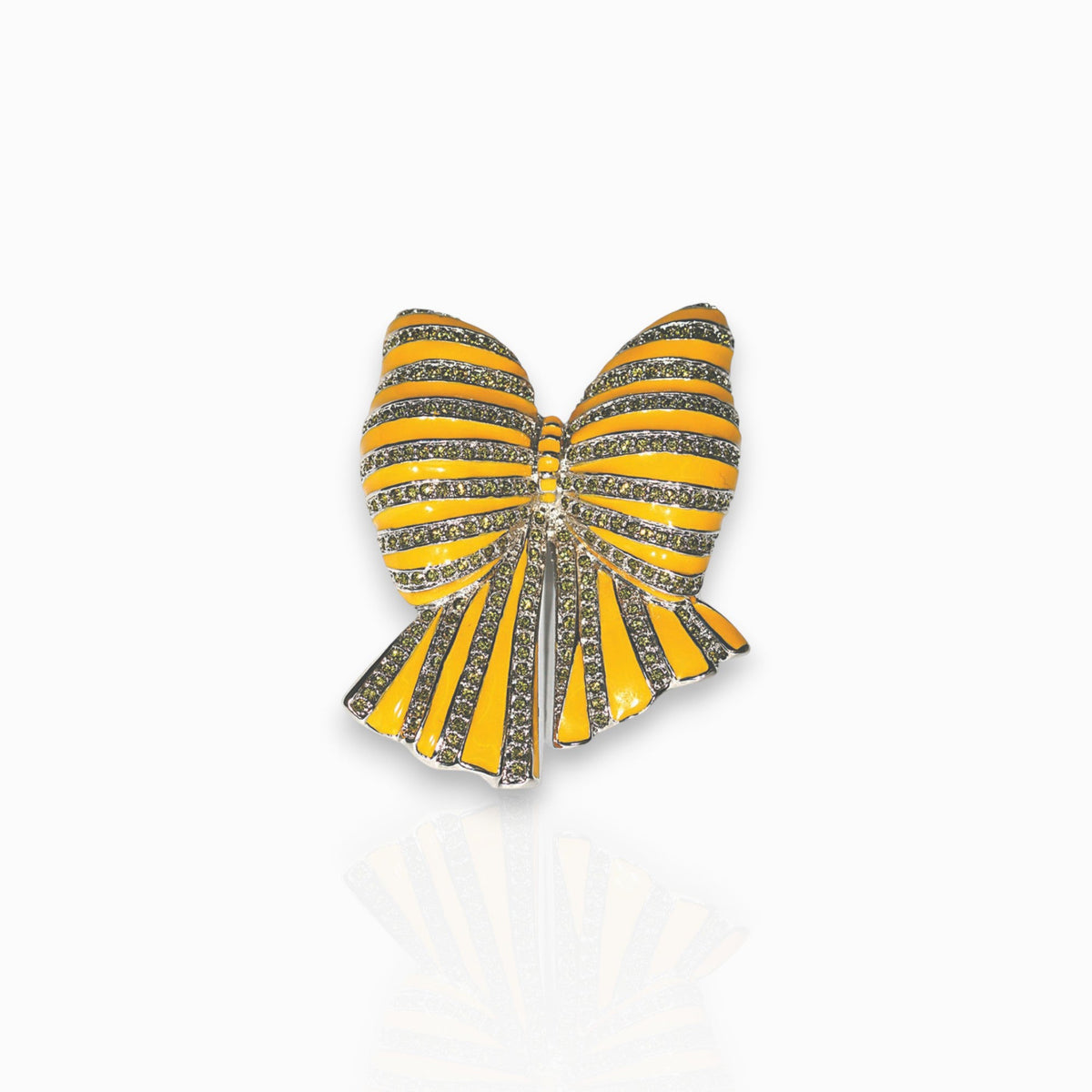 Bow Yellow Enamel and Crystal - Brooch on a white background.