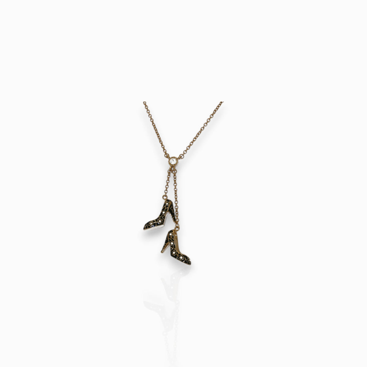 Black Shoe Charm - Necklace on a white background.