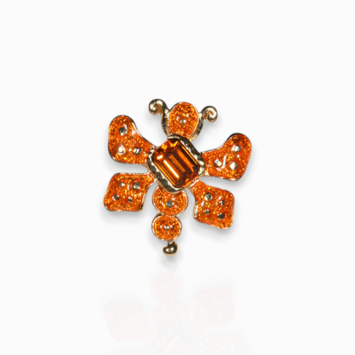 Orange Beetle Bug - Badge Pin on a white background.