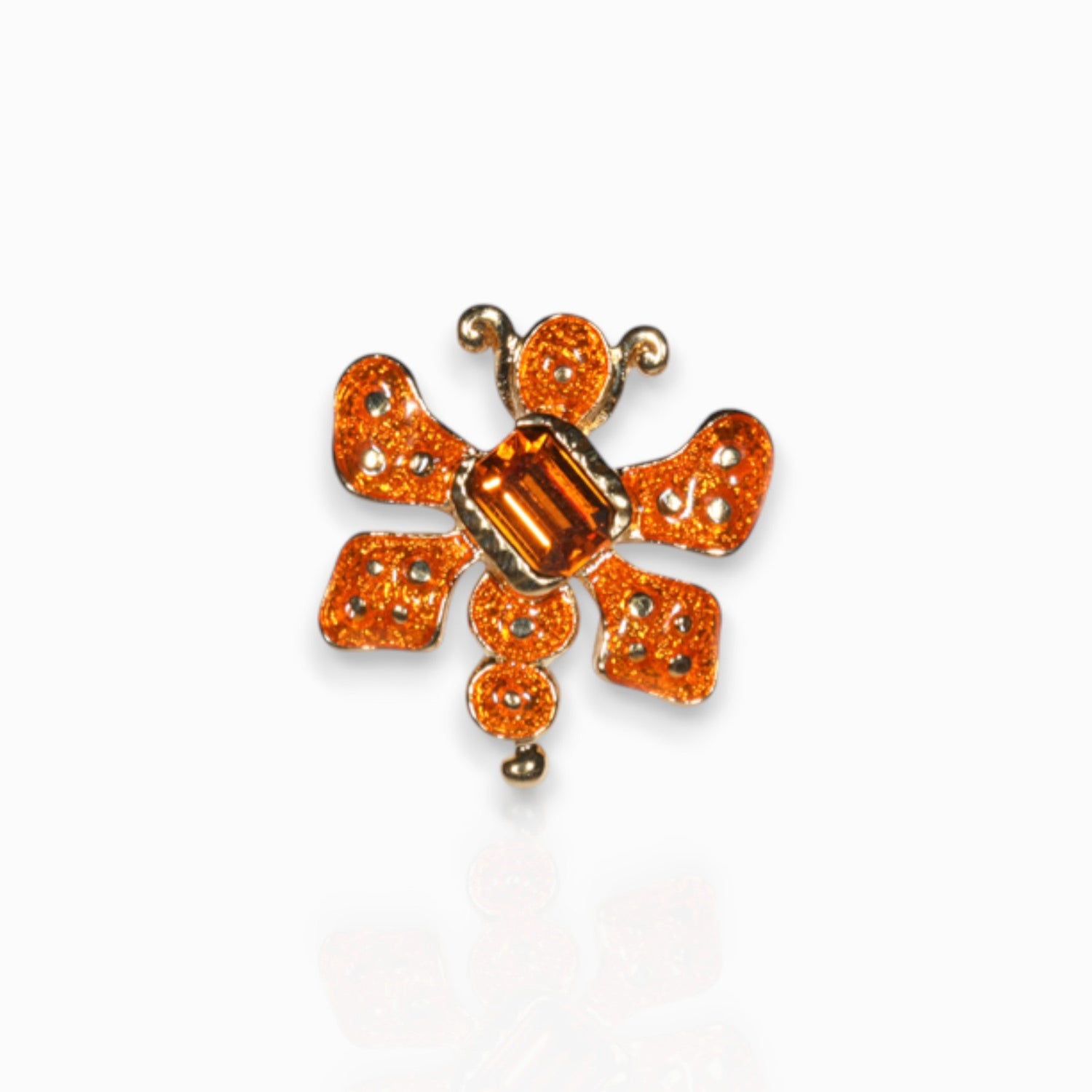 Orange Beetle Bug - Badge Pin on a white background.