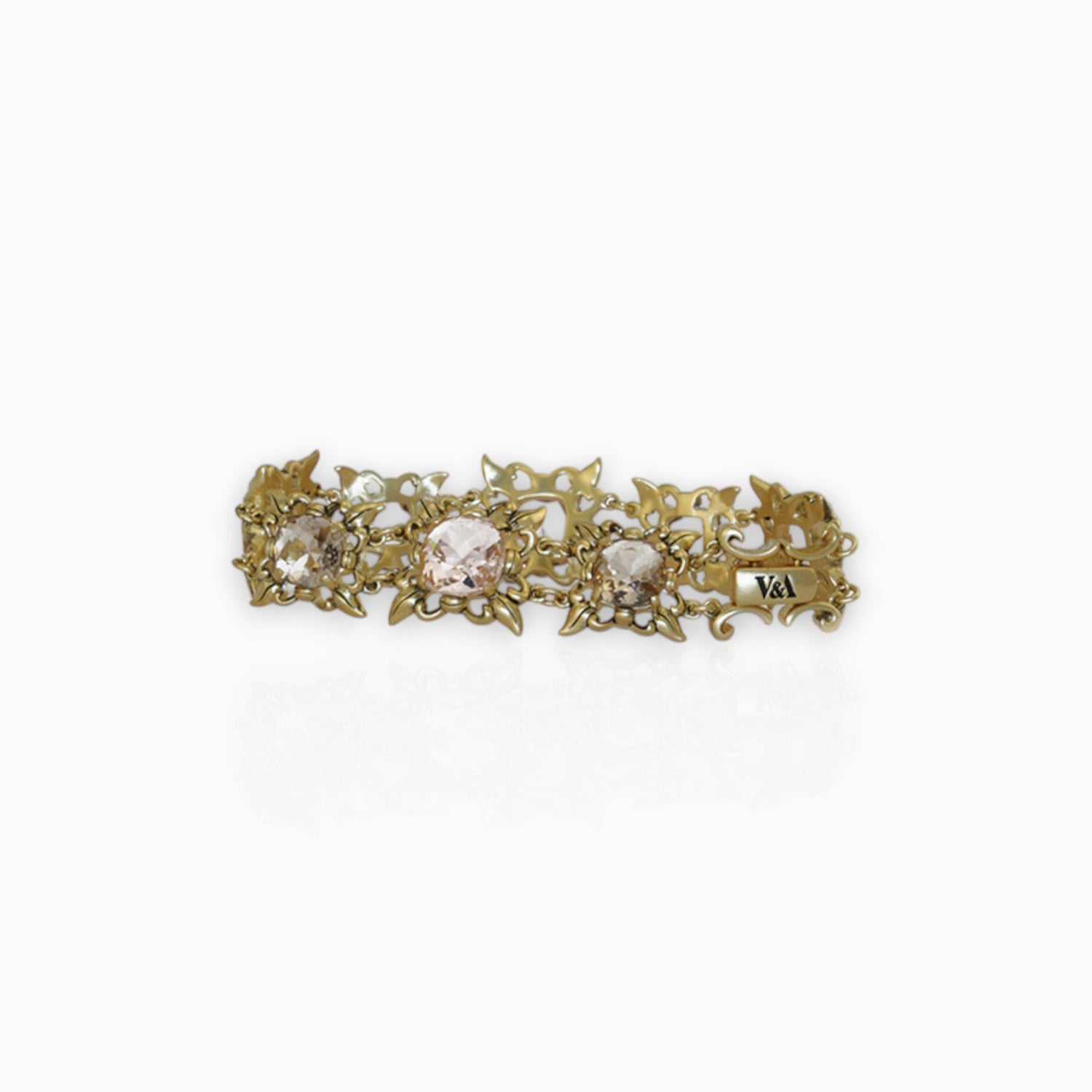 Rose-Cut Jewelled Cross Gold-Toned -  Bracelet on a white background.