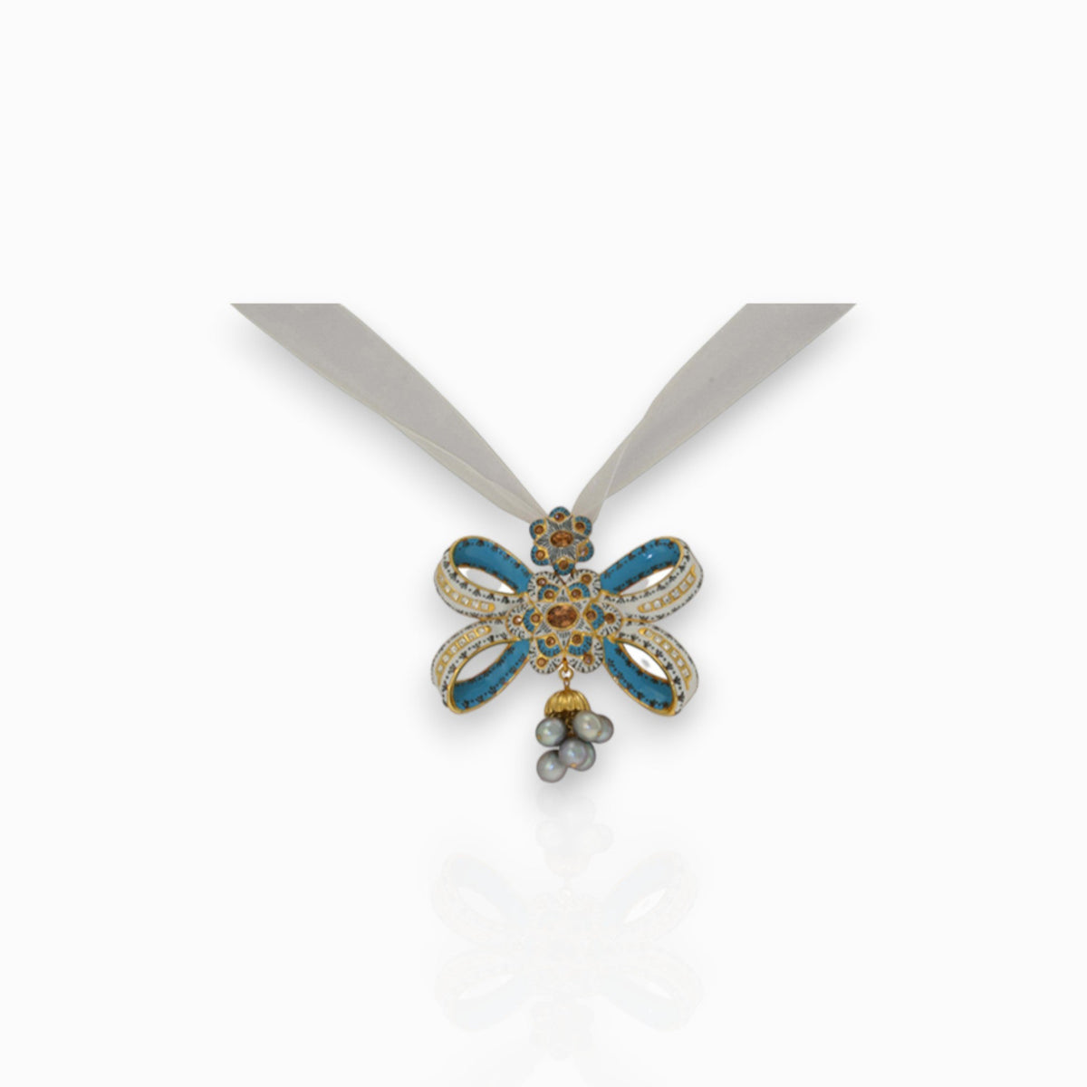 Blue Enamelled Bow - Pendant on a white background.