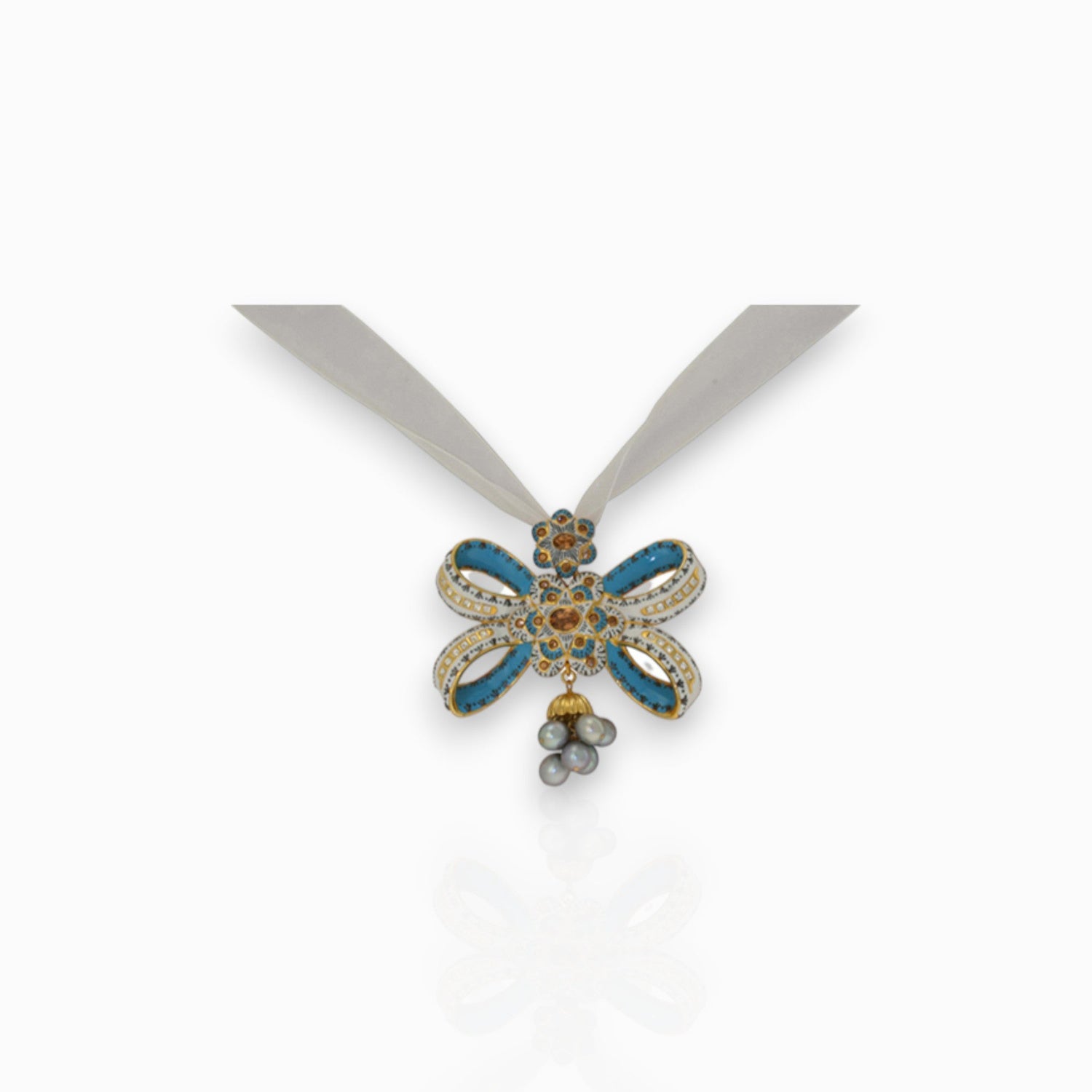 Blue Enamelled Bow - Pendant on a white background.