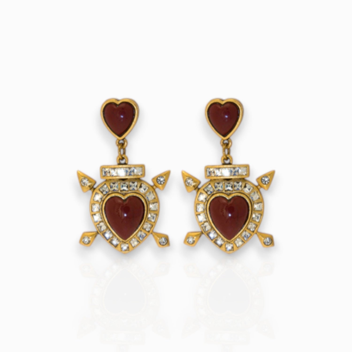 Heart and Arrows - Earrings on a white background.