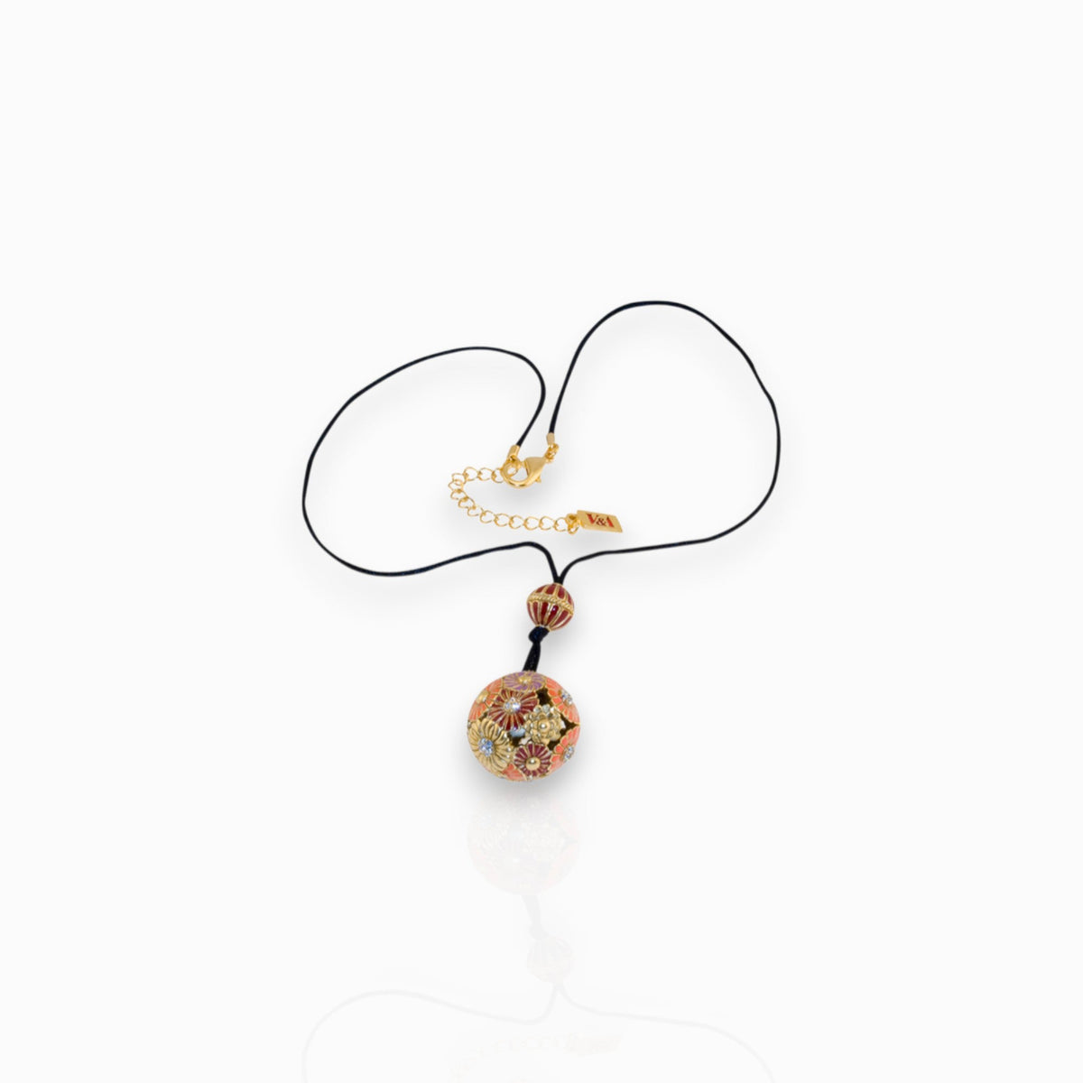 Japanese Inro Flower Ball - Pendant on a white background.