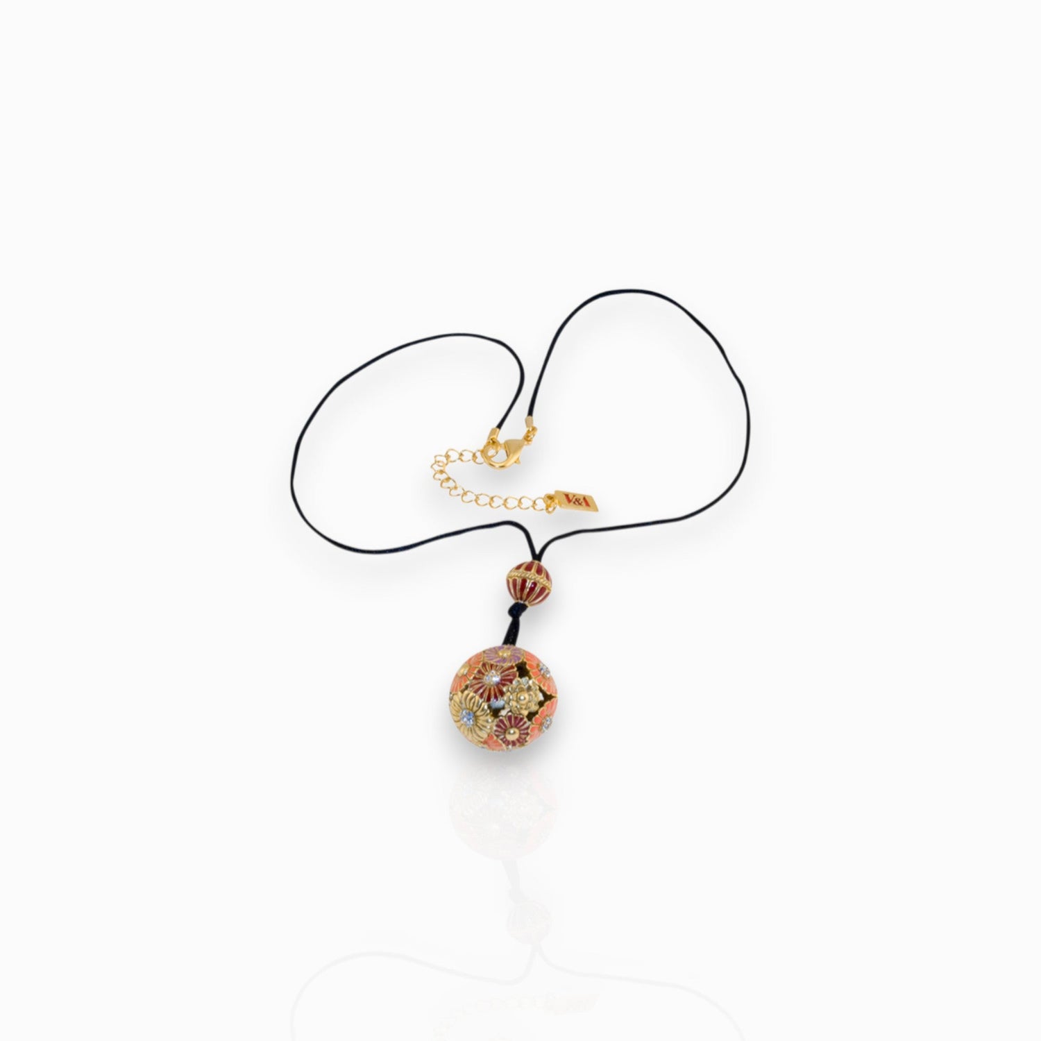 Japanese Inro Flower Ball - Pendant on a white background.