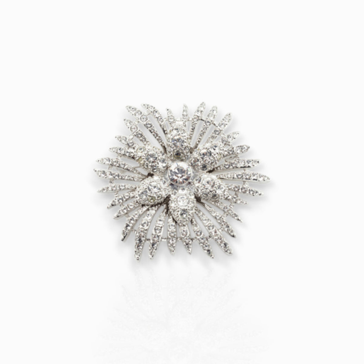 Crystal Flower Star - Brooch on a white background.