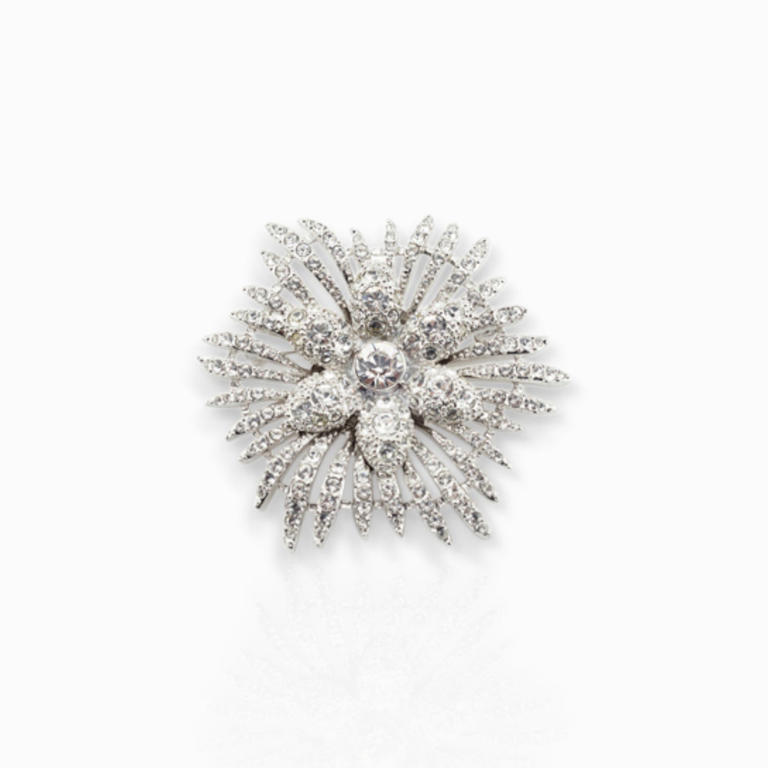 Crystal Flower Star - Brooch on a white background.