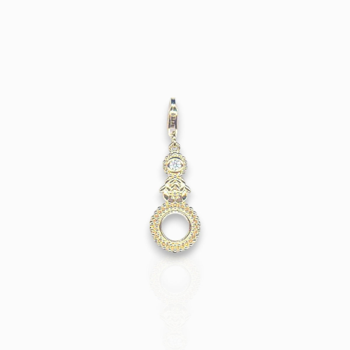 Silver Gold-Toned Eyeglass - Charm on a white background.