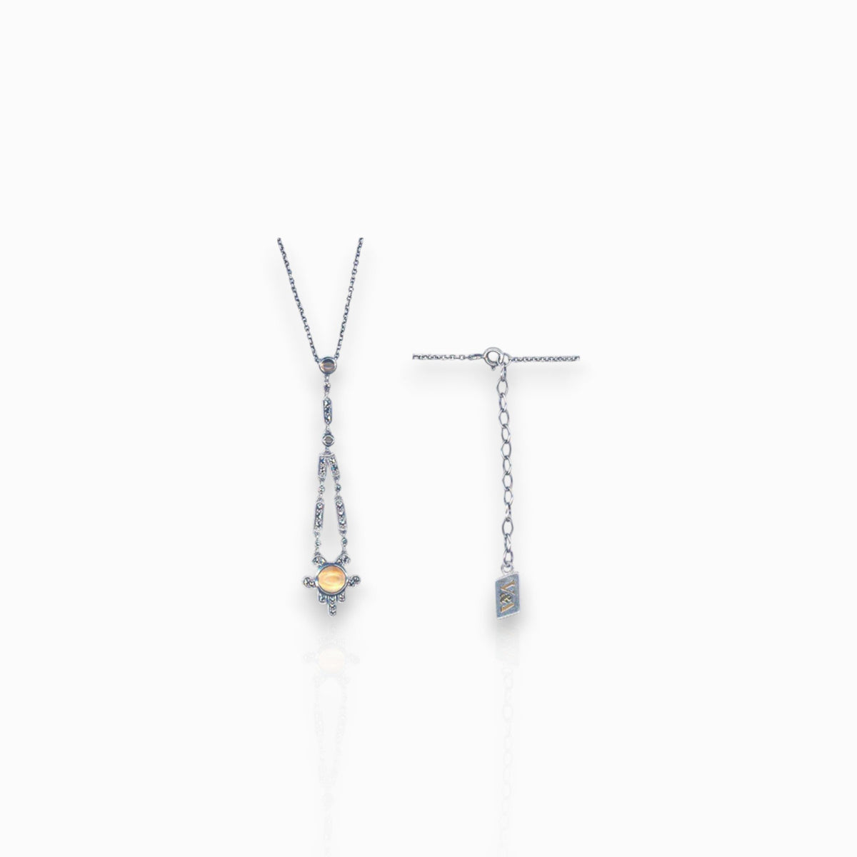 Silver Art Deco Citrine - Pendant on a white background.
