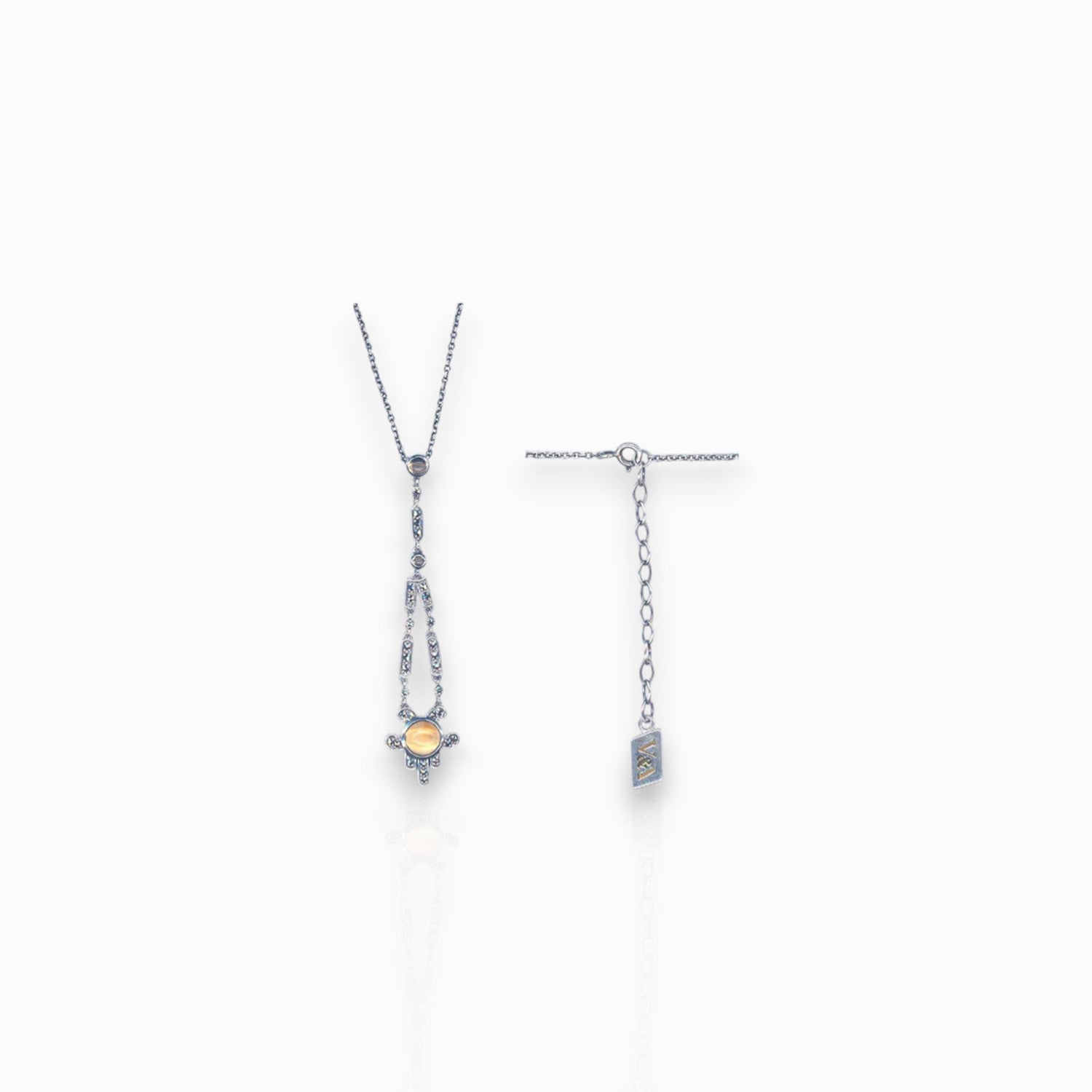 Silver Art Deco Citrine - Pendant on a white background.