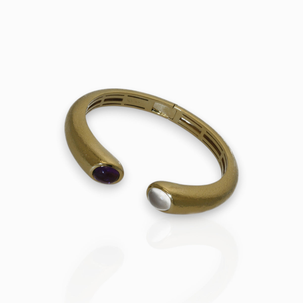Silver Moonstone and Amethyst Crimea - Gold Toned - Bangle on a white background.