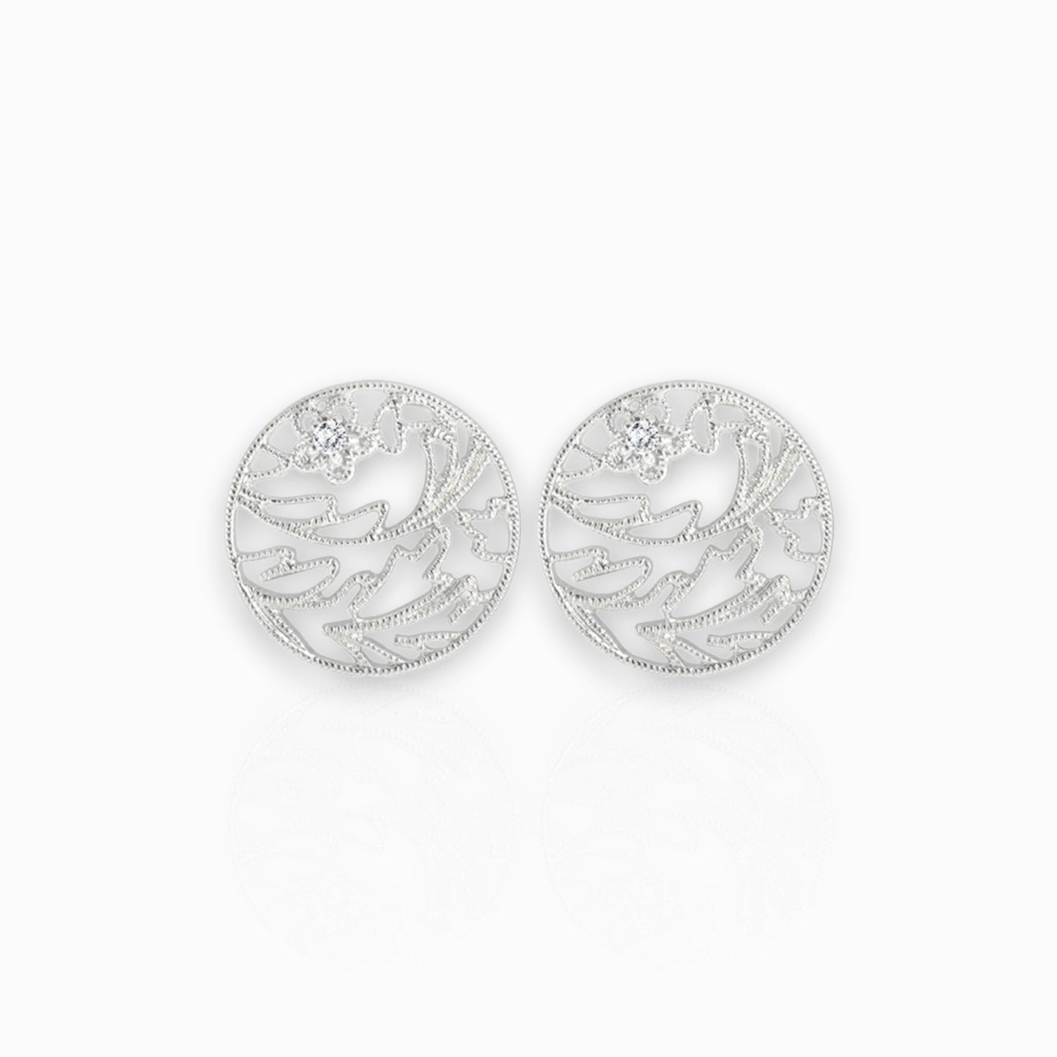 Irish Lace - Earrings on a white background.