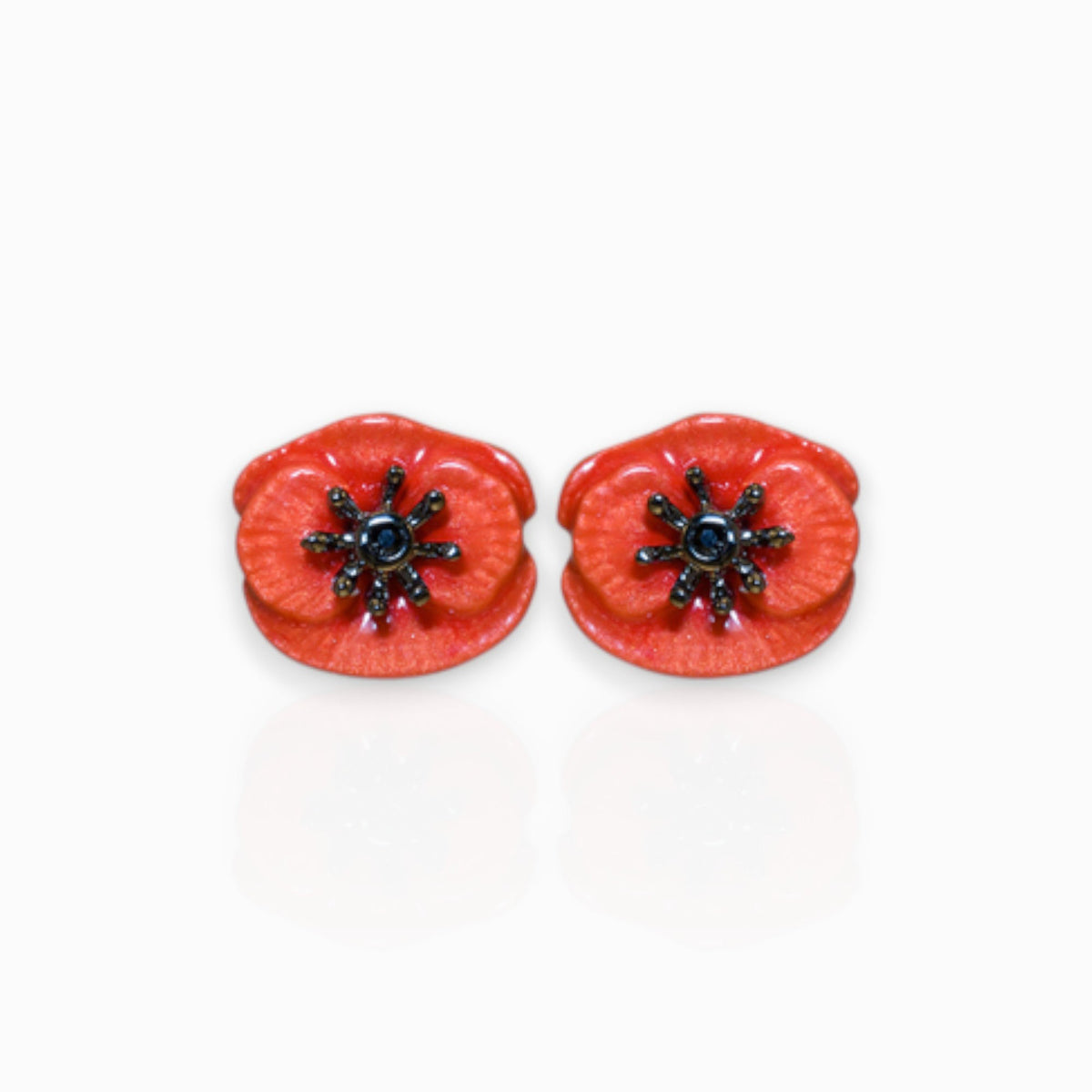 August Poppy - Earrings on a white background.