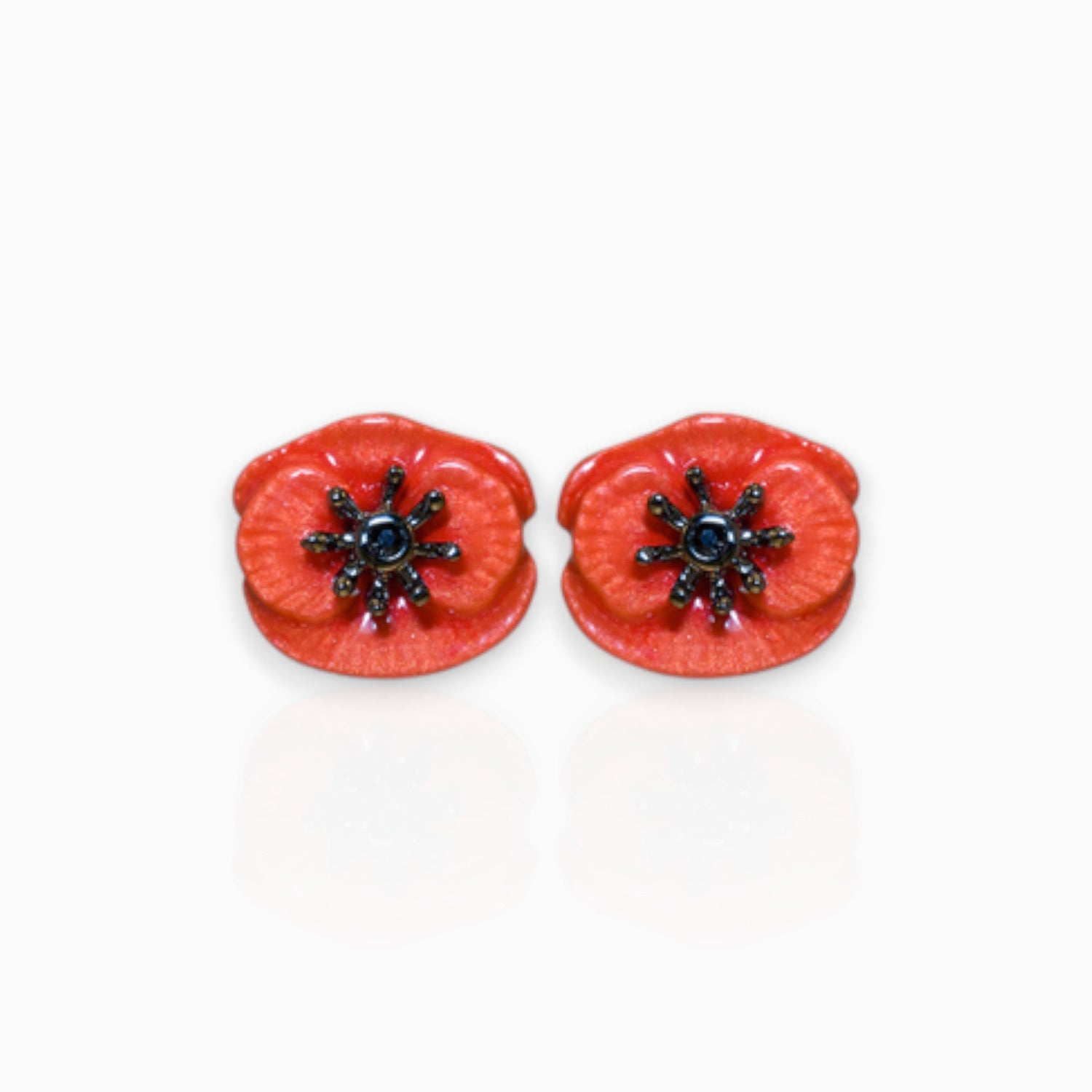 August Poppy - Earrings on a white background.