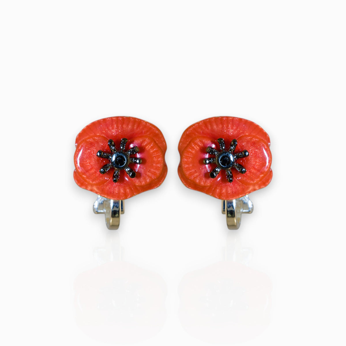 August Poppy - Clip-On Earrings on a white background.