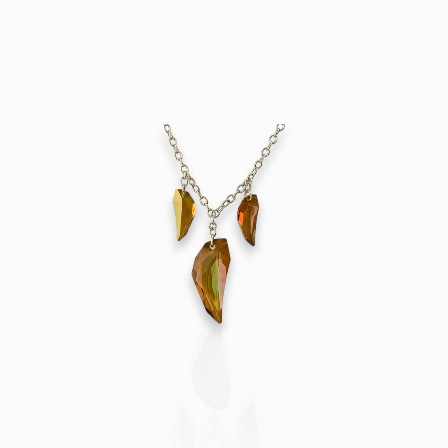 Origins Amber Crystal Claw - Necklace on a white background.