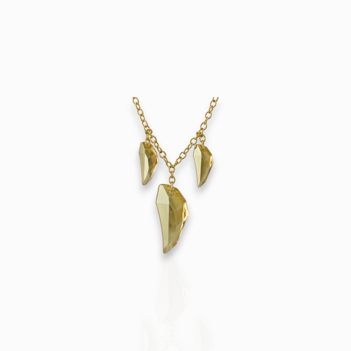 Origins Clear Crystal Claw - Necklace on a white background.