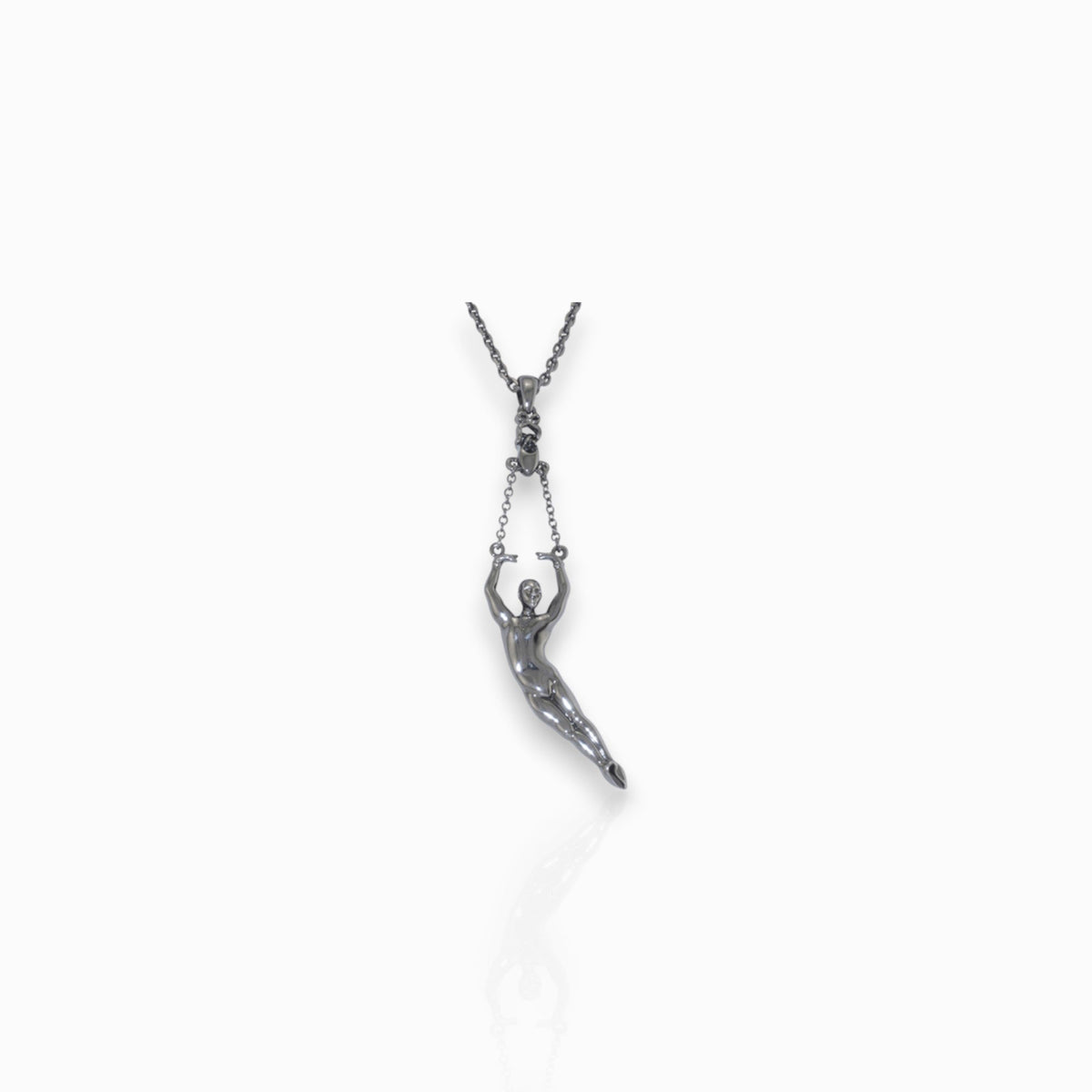 Male Ballet Dancer, in 5th pas de poisson - Hematite-Toned - Pendant on a white background.