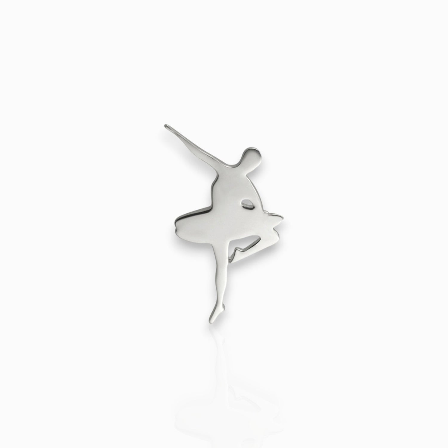 Silver ballerina pin-badge on a white background.