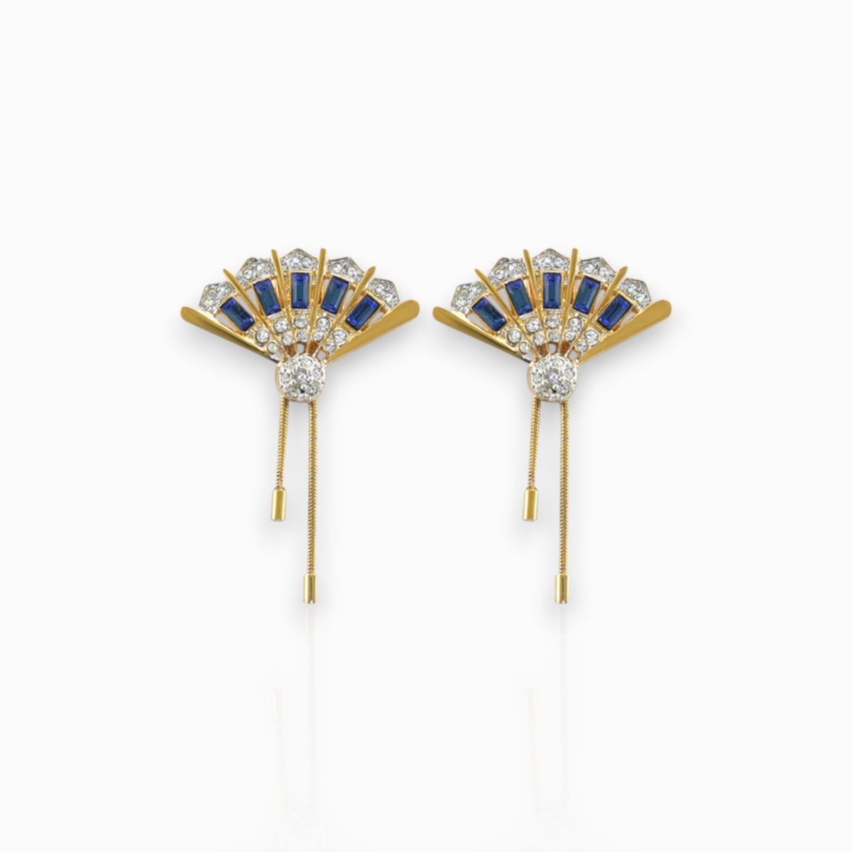 Marlene Dietrich - Earrings on a white background.