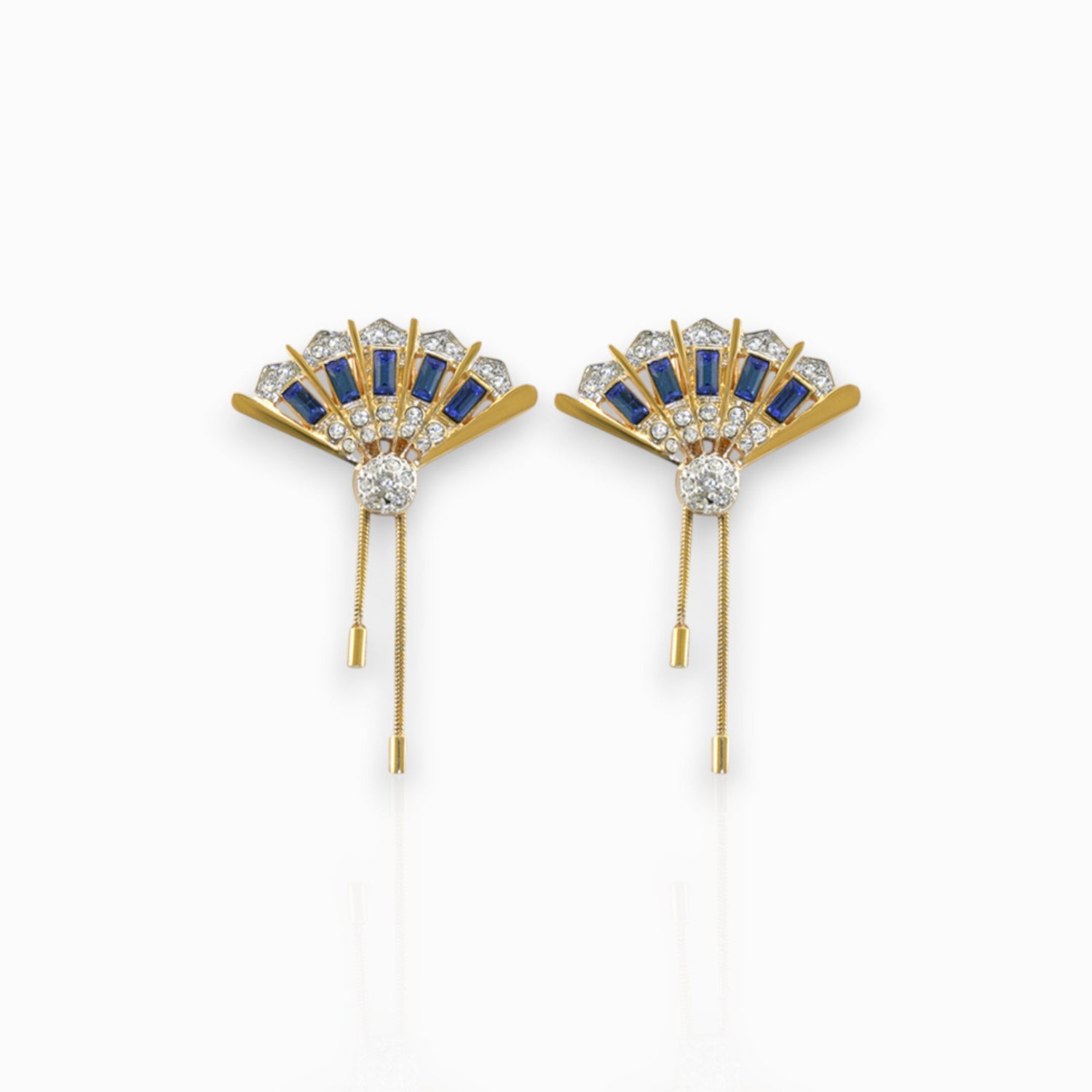 Marlene Dietrich - Earrings on a white background.