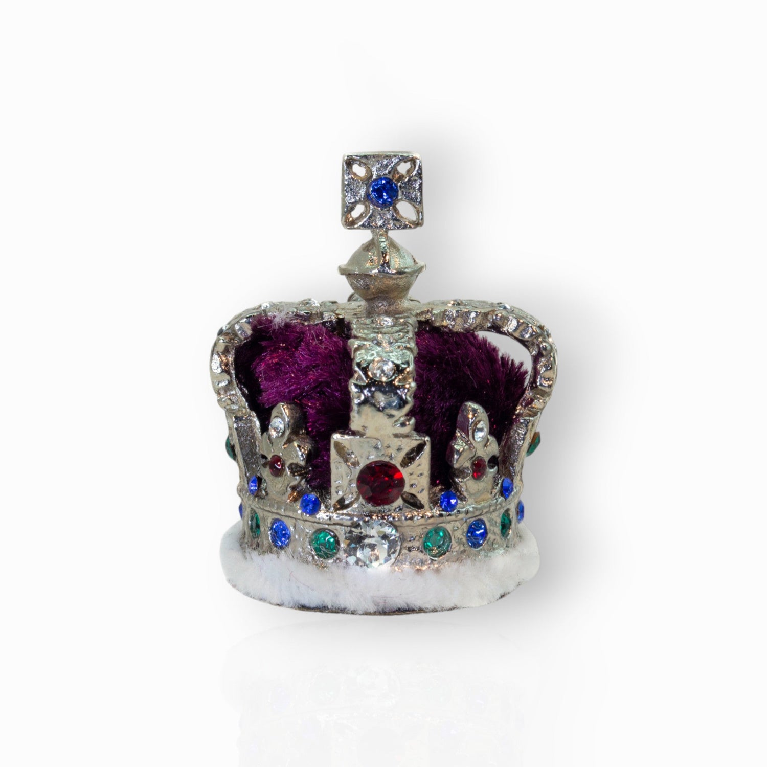 Decorative crown with colorful gemstones on a white background.