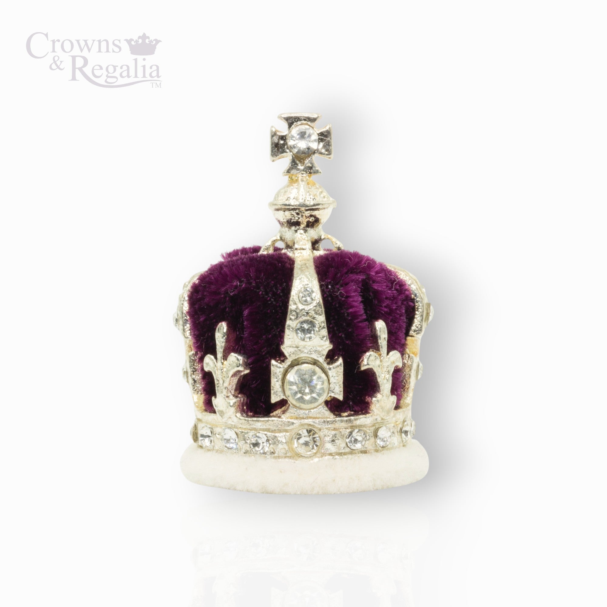 Silver crown with red center and gemstones on a white background, branded 'Crowns & Regalia'.