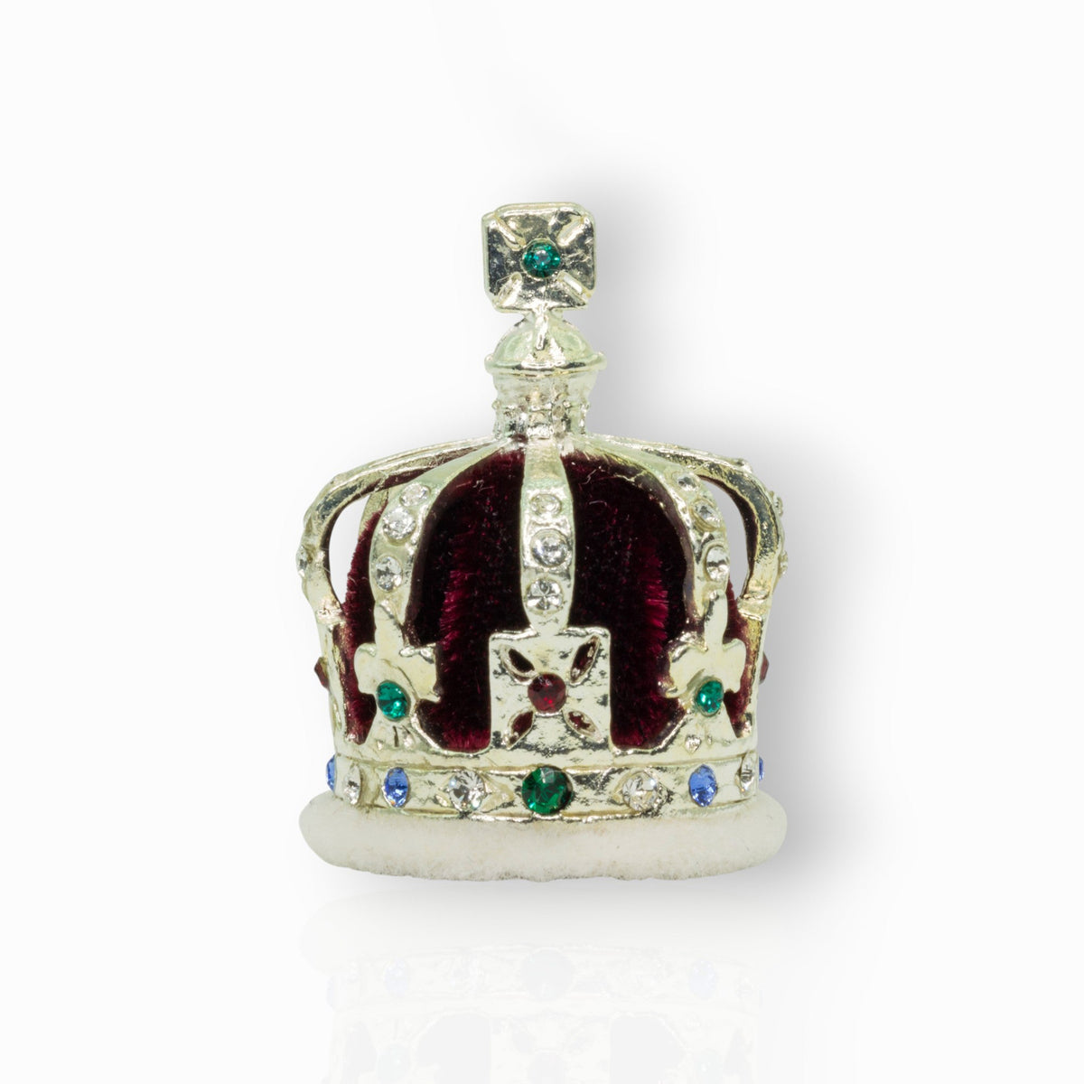 Decorative crown with gemstones on a white background.
