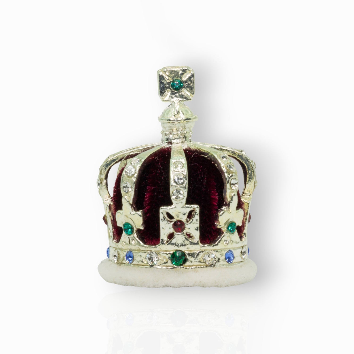 Decorative crown with gemstones on a white background.