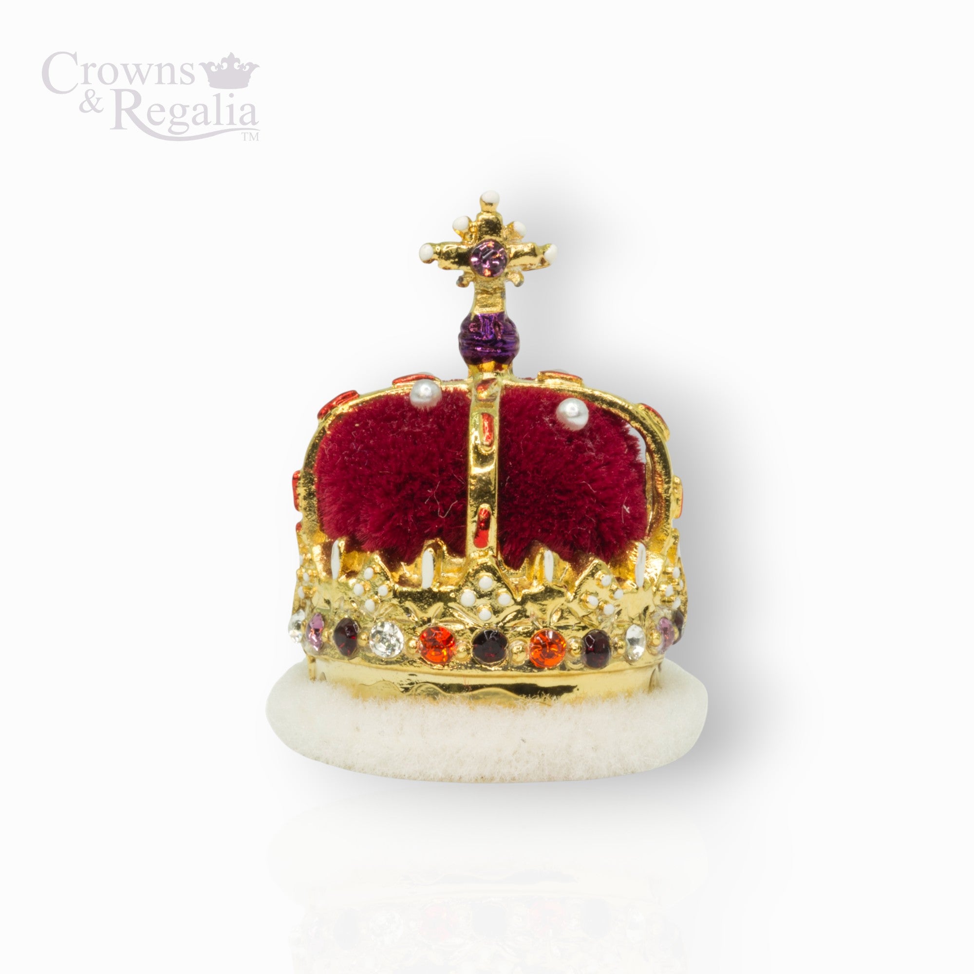 Gold crown with a cross on top, featuring colored gemstones, on a white background with 'Crowns & Regalia' branding.