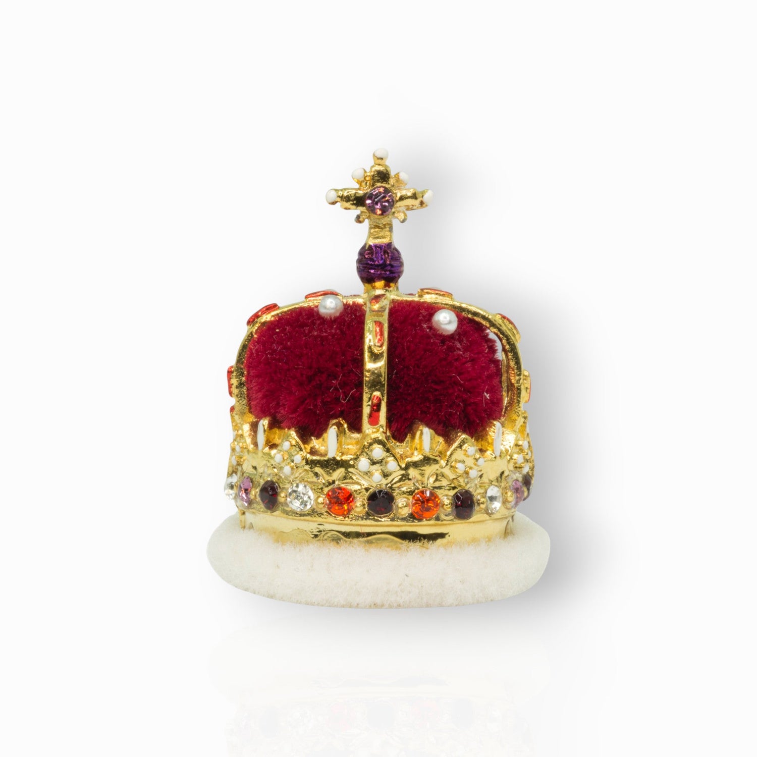 Gold crown with a cross on top, featuring colored gemstones, on a white background.