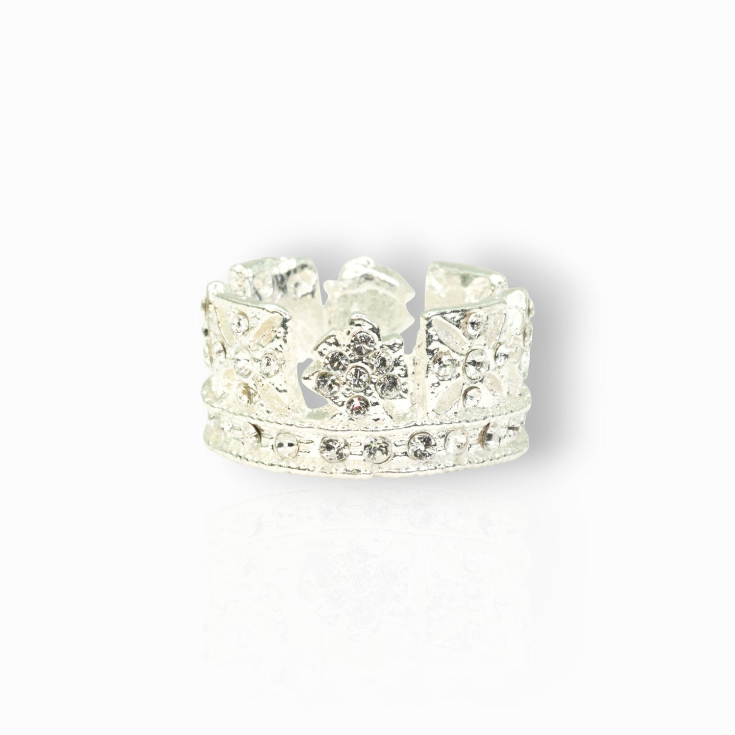 Silver crown-shaped object with gemstones on a white background.