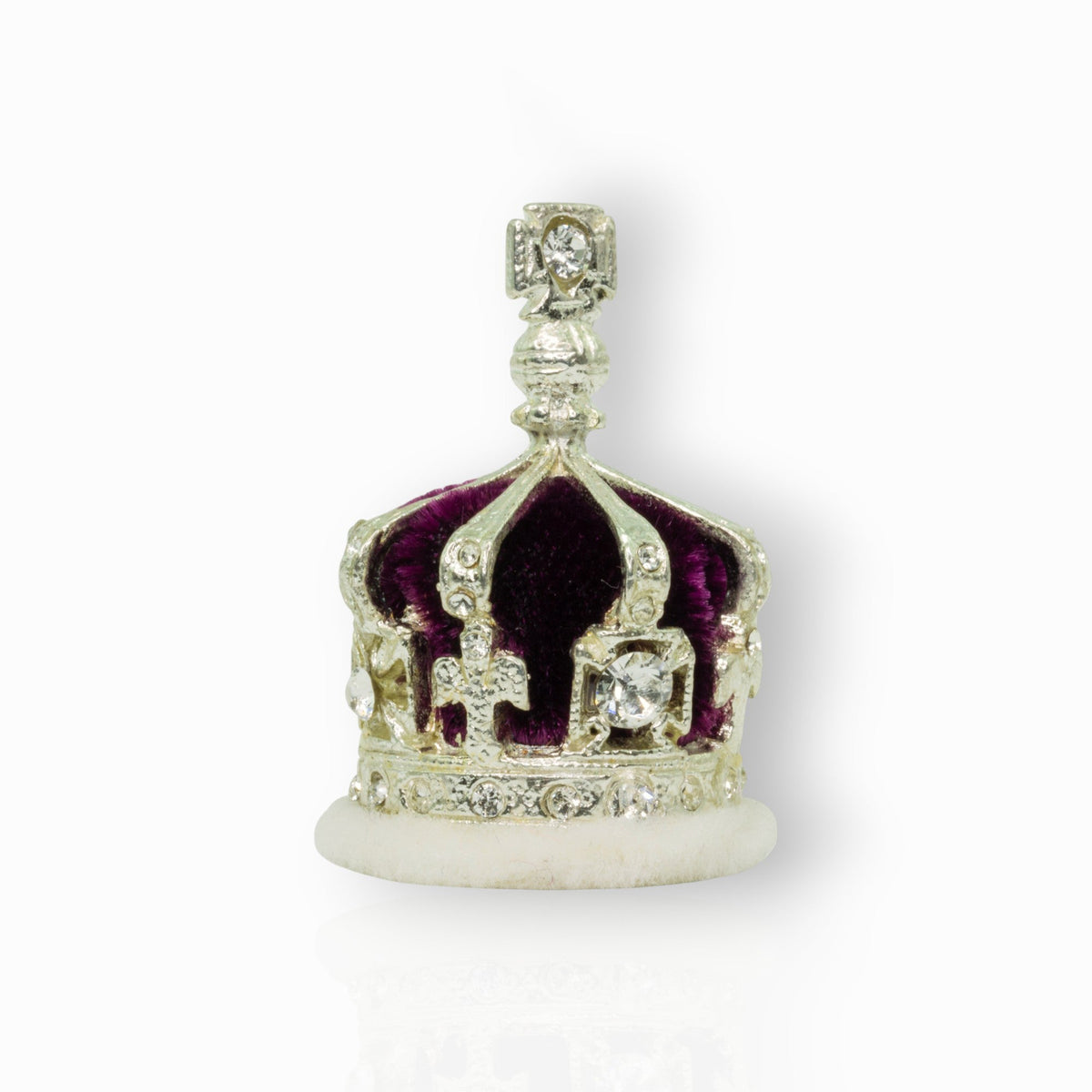 Decorative crown with purple center and gold accents on a white background.