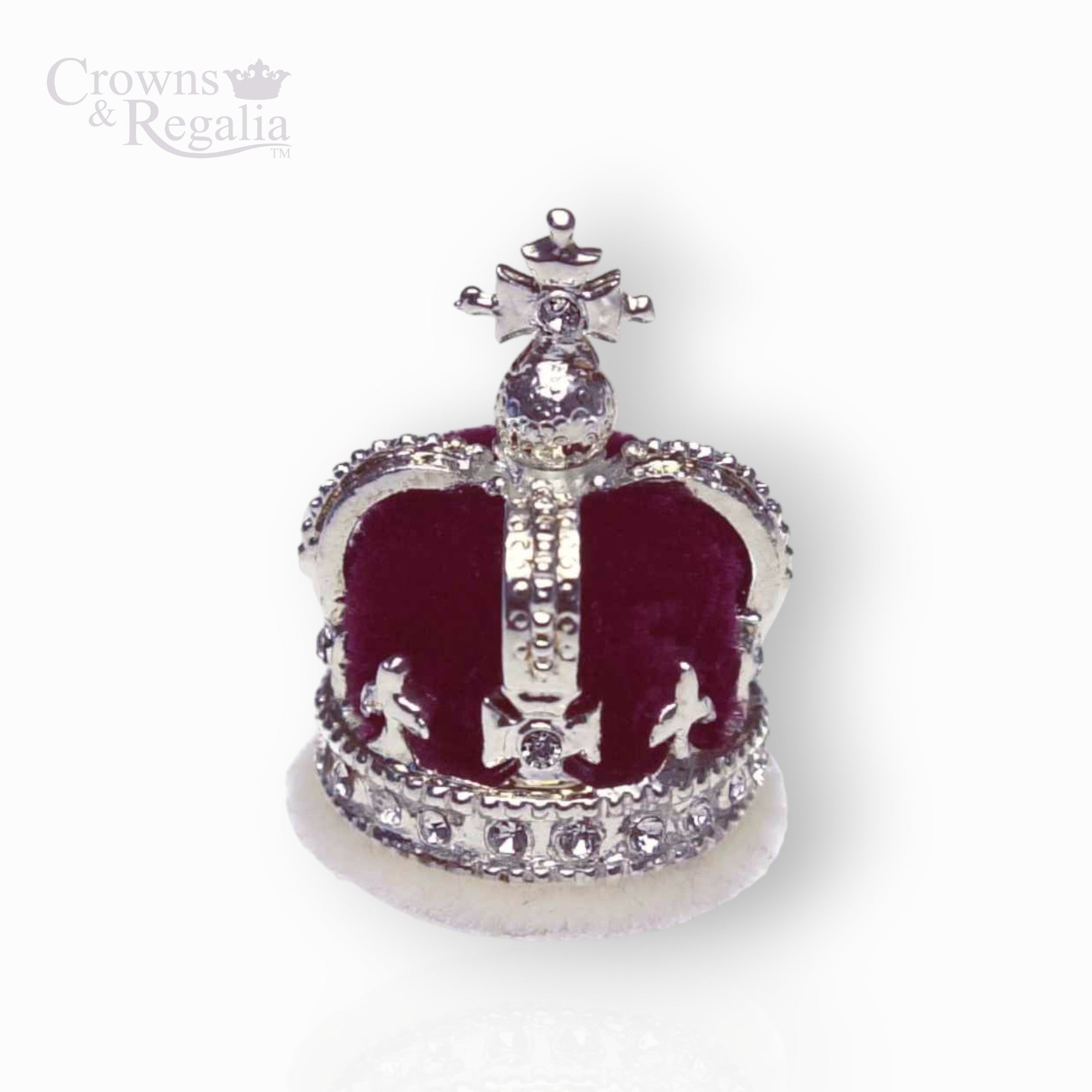 Decorative crown with red velvet and silver accents on a white background, branded 'Crowns & Regalia'.