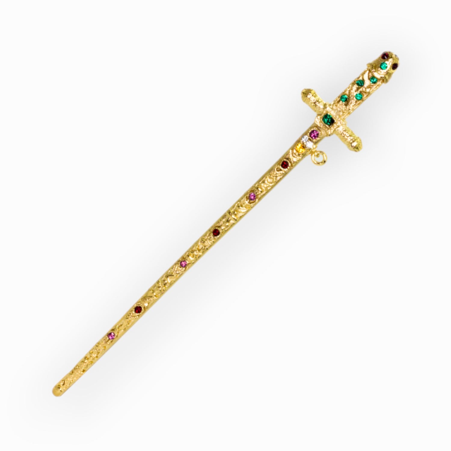 Decorative gold sword with gemstones on a white background.