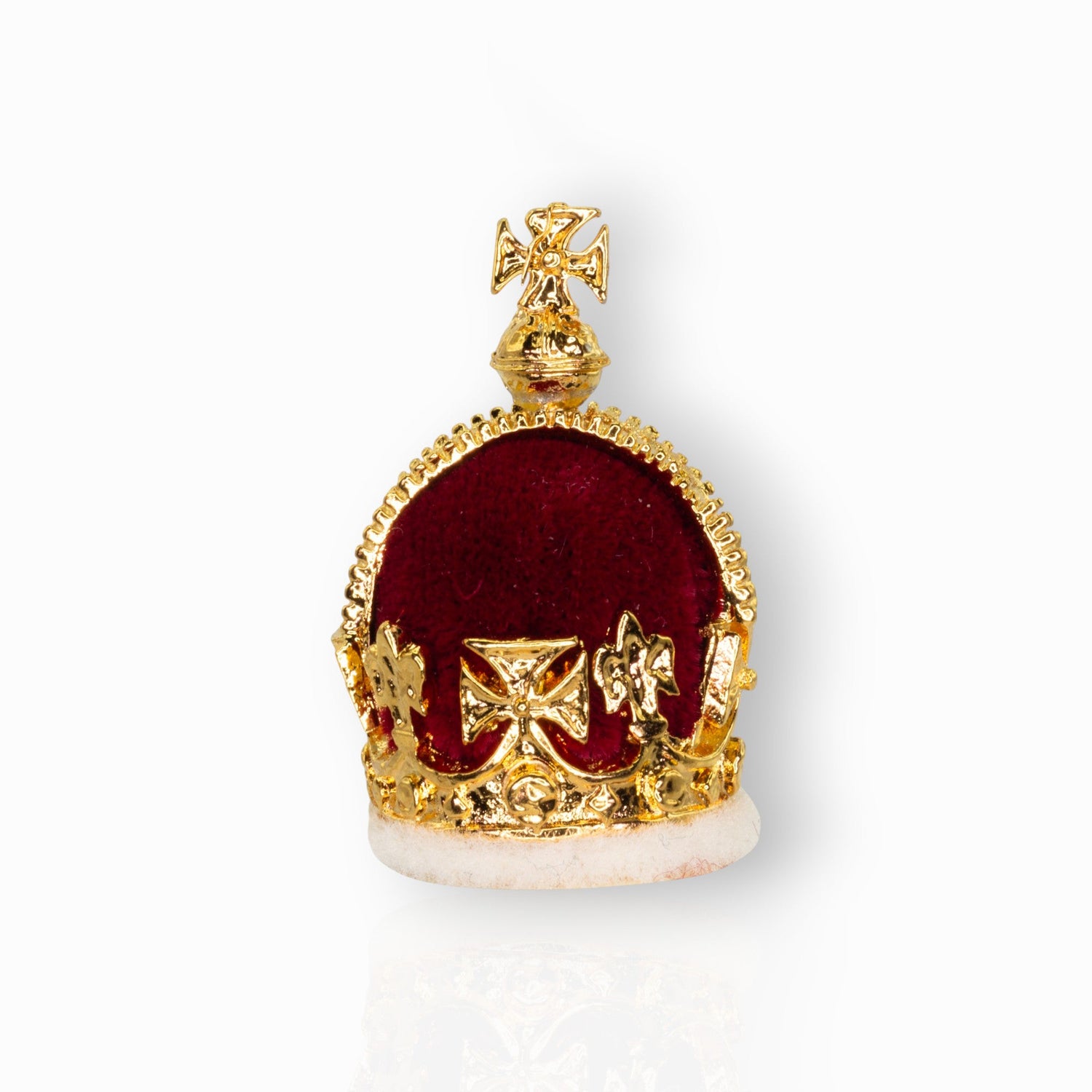 Gold crown with red velvet interior on a white background.