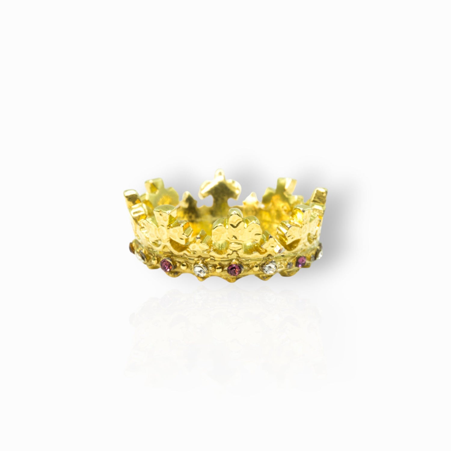 Gold crown with gemstones on a white background.