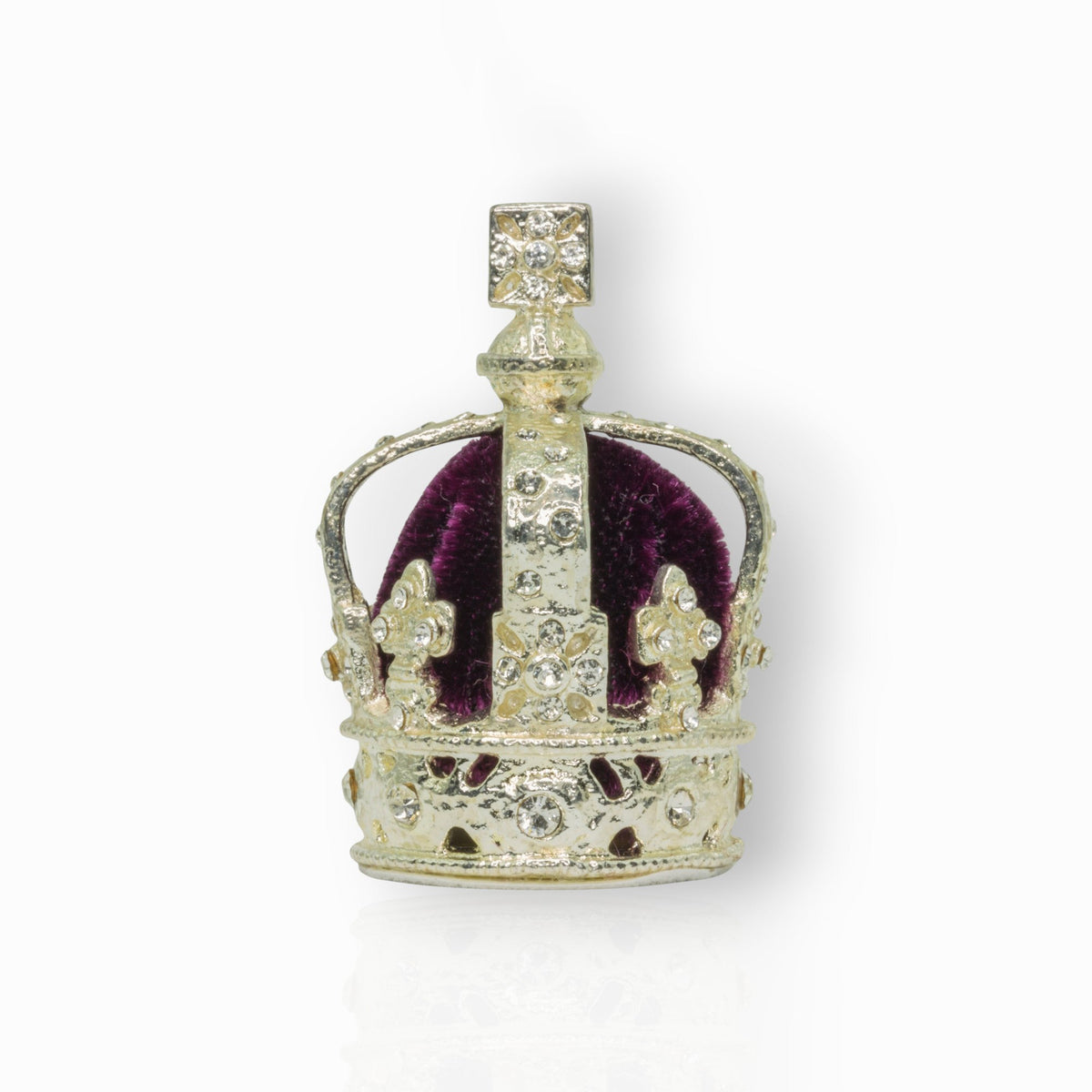 Decorative crown with purple velvet center on a white background.